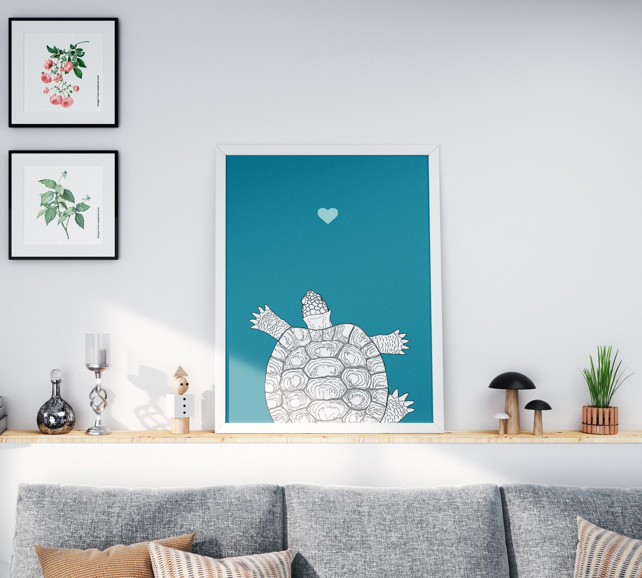 A black & white A4 digital illustration of a tortoise in a frame. Set on wooden shelf above a grey sofa.