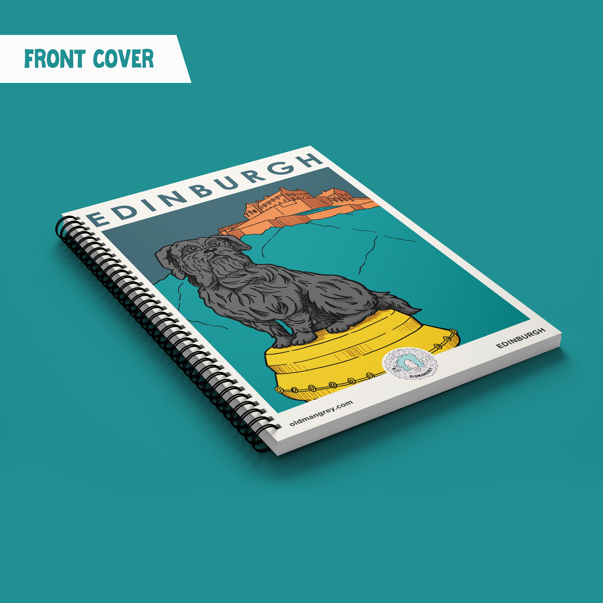 My A5 Greyfriars Bobby wire bound notebook lying diagonally on a deep teal backdrop with a title flash 'Front Cover'. It has a digital illustration of Greyfriars Bobby under the title 'Edinburgh'.