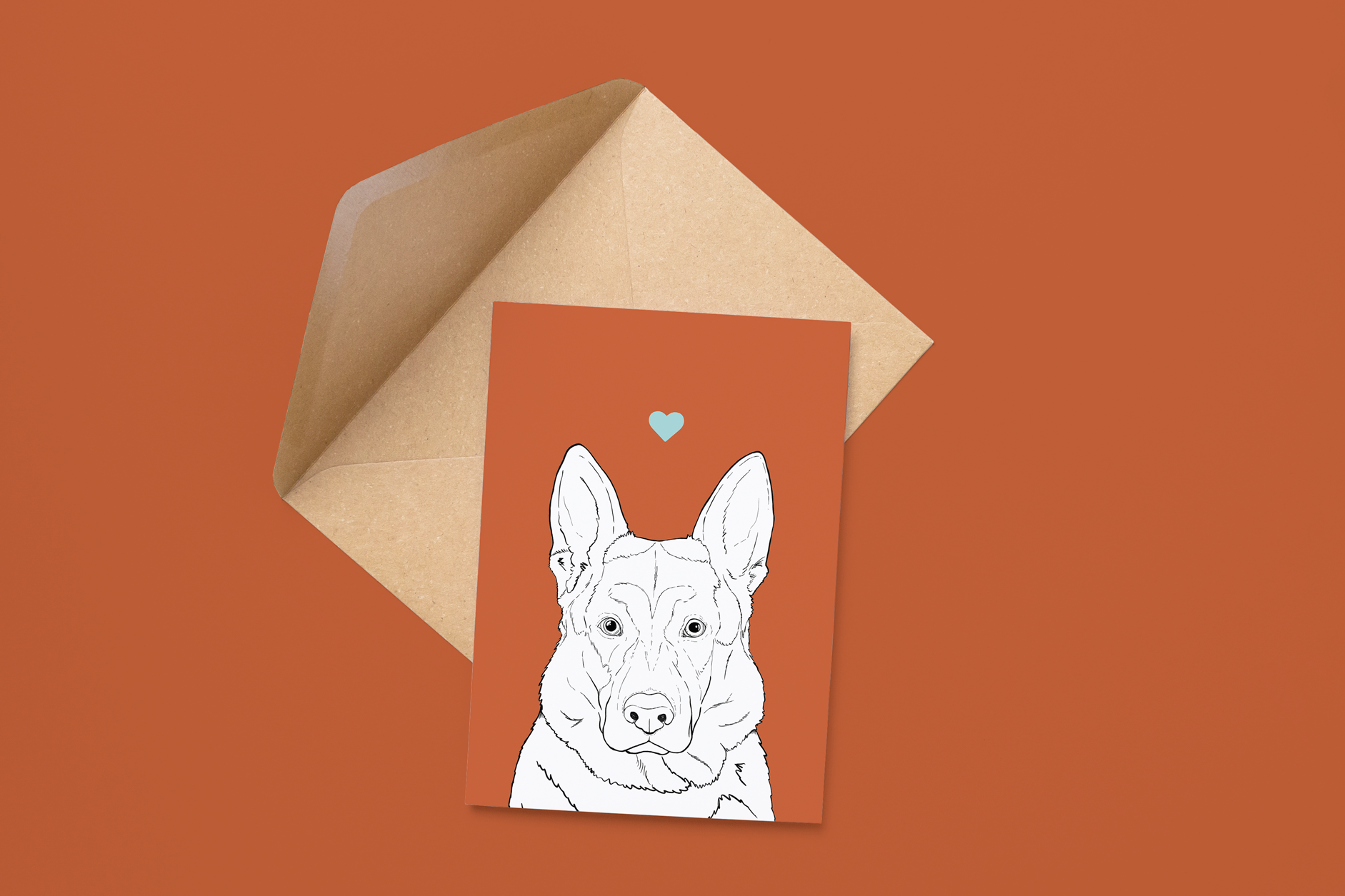An A6 greetings card on a brown envelope. The card & image have a deep red background, with a black & white digital illustration of the head & shoulders of an Alsatian / German Shepherd dog.