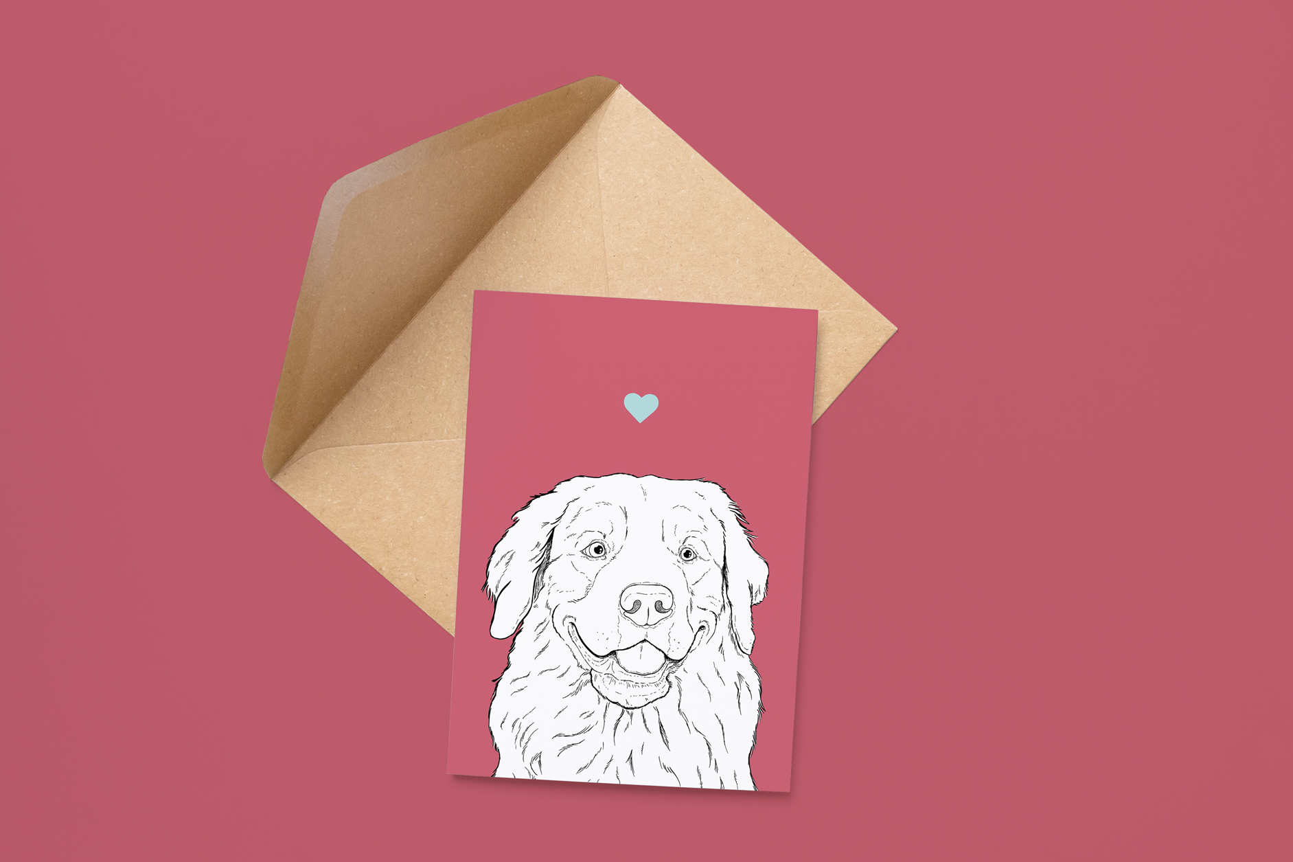 An A6 greetings card on a brown envelope. The card & image have a purple red background, with a black & white digital illustration of the head & shoulders of a Golden Retriever dog.