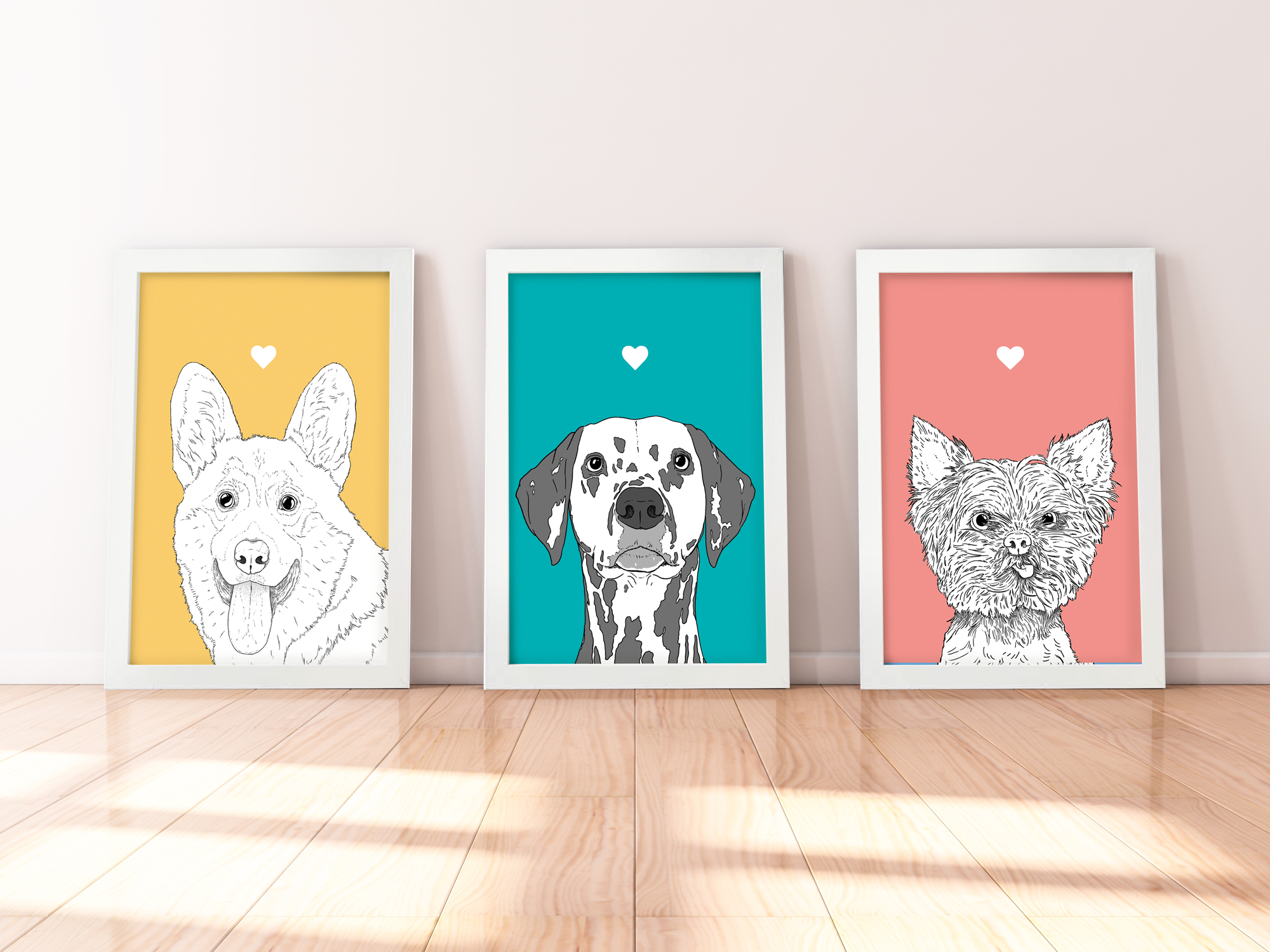 A trio of A4 prints in white wooden frames leaning against a white wall. Each has a black & white digital illustration of the head & shoulders of a different dog breed: Corgi, Dalmatian, Yorkie