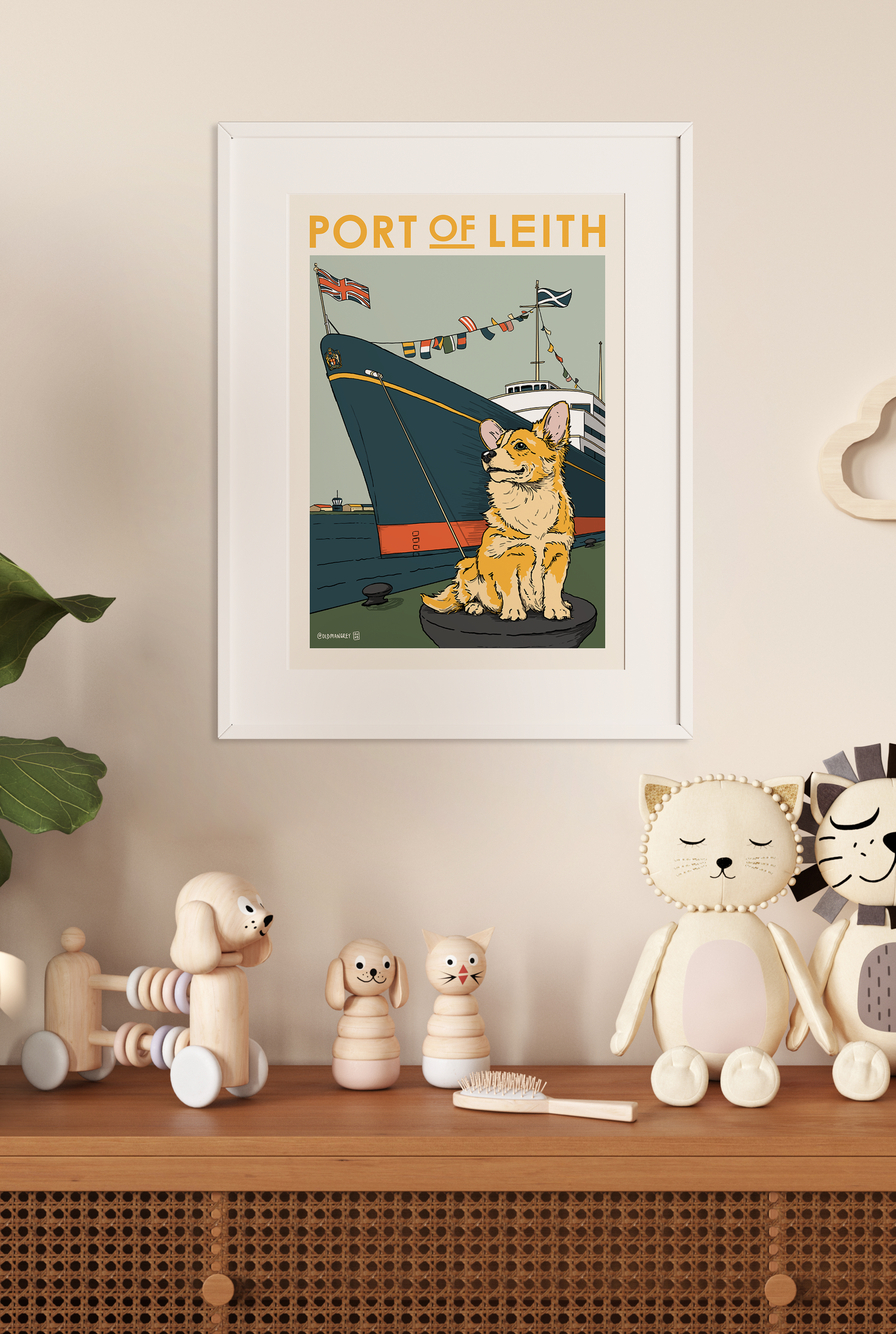 A4 digital illustration of a Corgi set against the Royal Yacht Britannia. Set on a plain white wall with toys below.