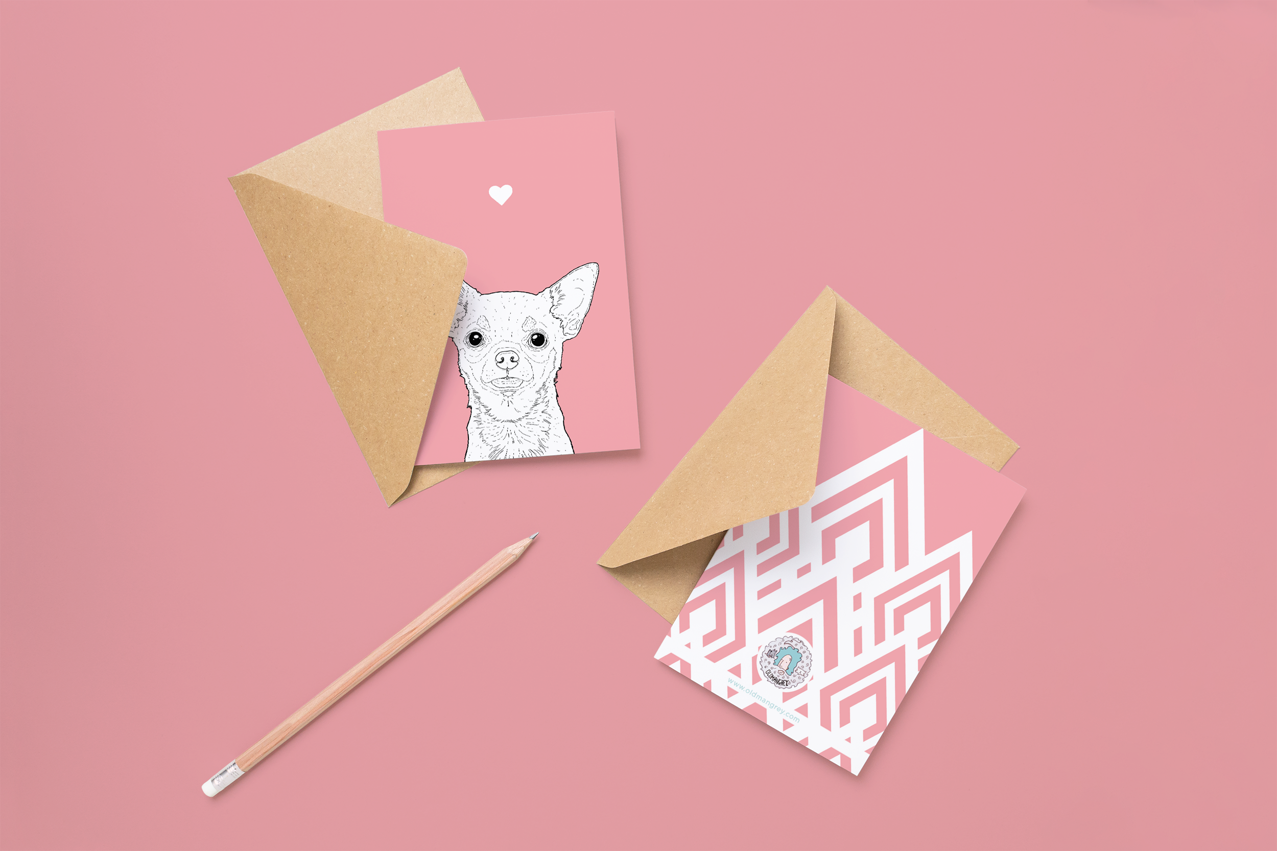 Two cards on brown envelopes, one face up one down. The card and image have a pink coloured background, with a black & white digital illustration of the head & shoulders of a Chihuahua dog.