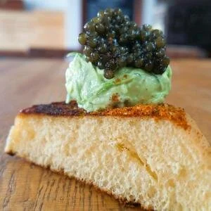 Executive Chef Doug Ruley created a new dish just for Bluecoast Rehoboth: Martin's potato bread toasted with a touch of Old Bay, topped with whipped chive butter and a dollop of Ossetra Caviar. BOB YESBEK PHOTO