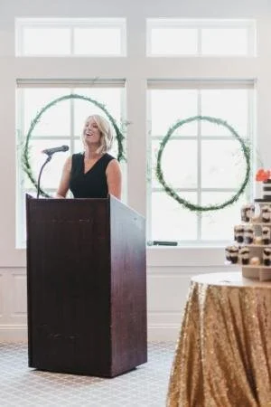 Clubhouse at Baywood Director of Events Sarah Dickinson welcomes attendees to the Delaware Perfect Wedding Guide spring luncheon. Maria DeForrest PHOTO