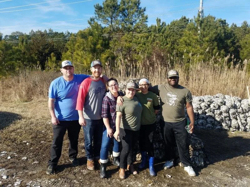 Bagging oyster shells as part of the Delaware Center for the Inland Bays’ Don’t Chuck your Shucks program are Matt’s Fish Camp employees (l-r) Dave Inman, Jack Temple, Lorena Torres, Zulma Barahona, Mayra Roork and T.J. Mack.