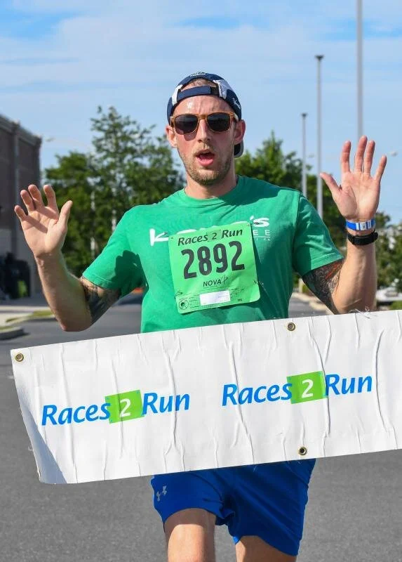 Matt Latimer wins the race in a time of 17:53.