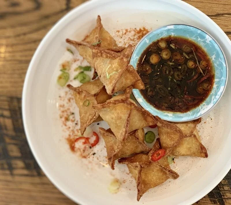 The classic crab Rangoon will be a novel nosh at Thompson Island Brewing Company.