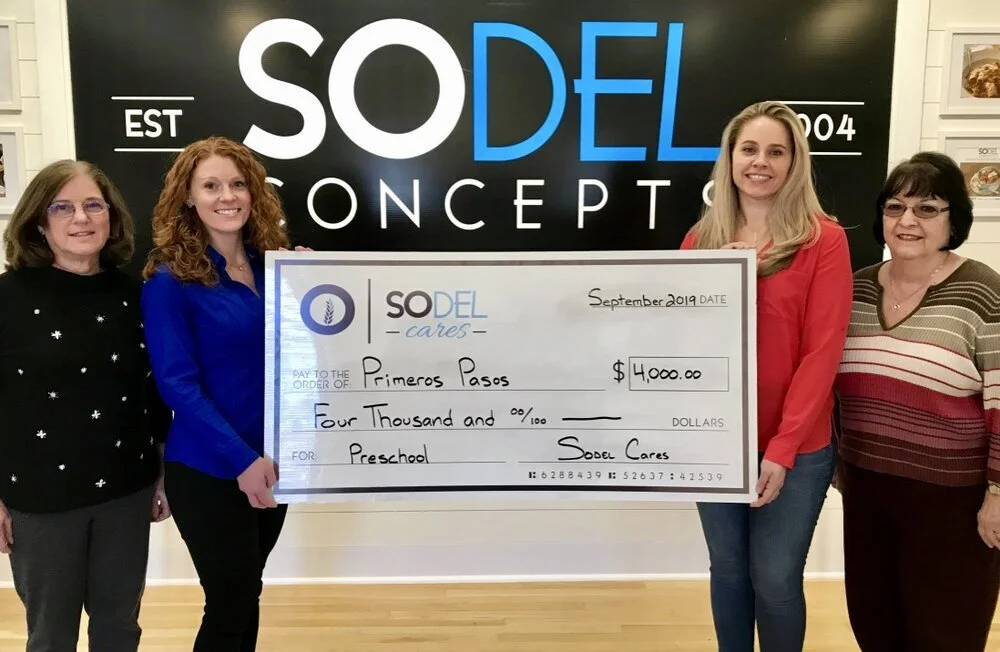 SoDel Cares, the philanthropic arm of SoDel Concepts, recently donated $4,000 to Primeros Pasos, an early childhood care and education center in Georgetown, Delaware. From left: Sandy Barker, president of the board of Primeros Pasos; Casey Christoph…