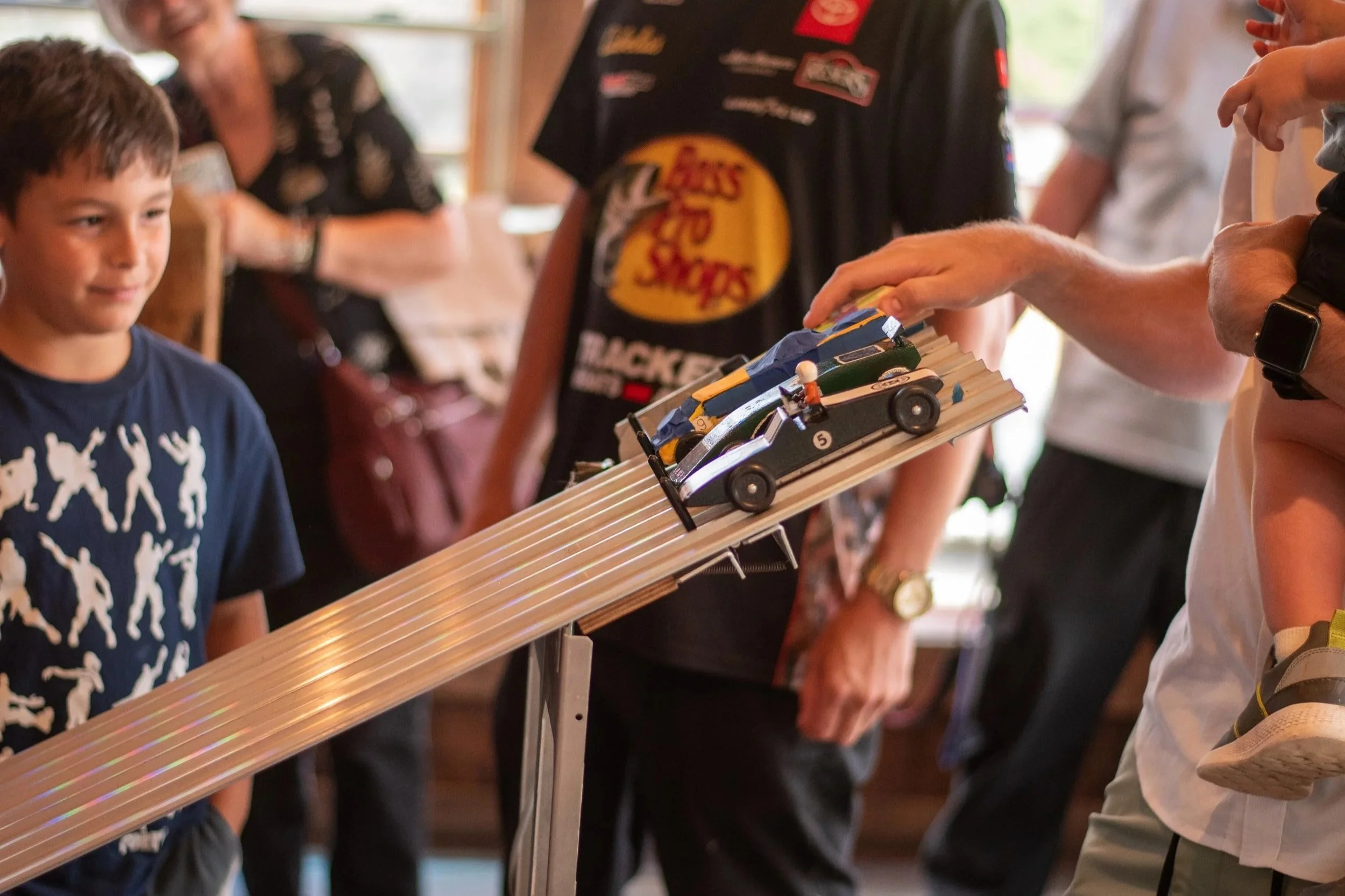 Pinewood Derby Rolls Back into Madigan’s November 23 for Racing, Fun, and Community Giving