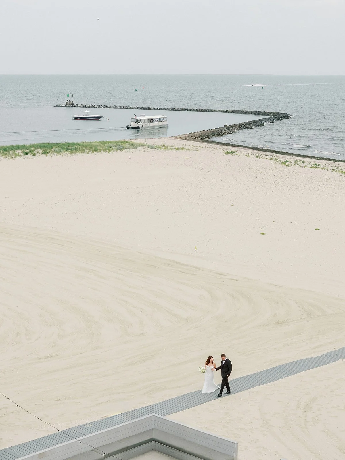 WychmereWedding_FirstLookonBeach_ErinDaviesConsultancy4.jpg