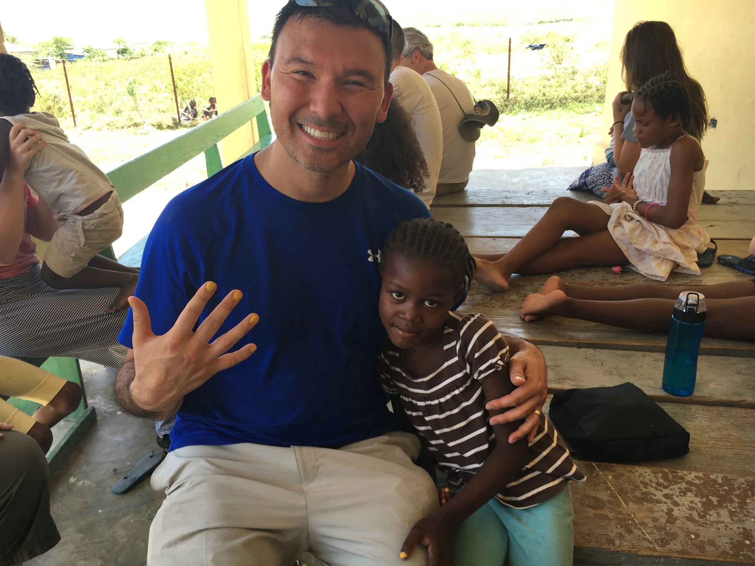 Getting my fingernails painted at The Joesph School in Haiti