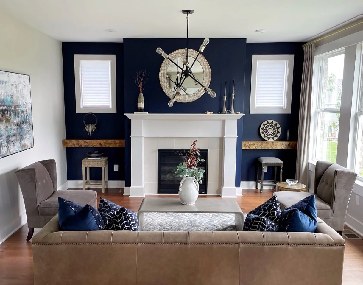 The power of paint! 🪄

I picked the dark navy to bring out the beautiful details of the fireplace and burl wood floating shelves.  Of course, then we needed some new accent pillows to match! 👌🏼 

Swipe 👉🏼for before and progress pics! 👩🏼&zwj;🎨