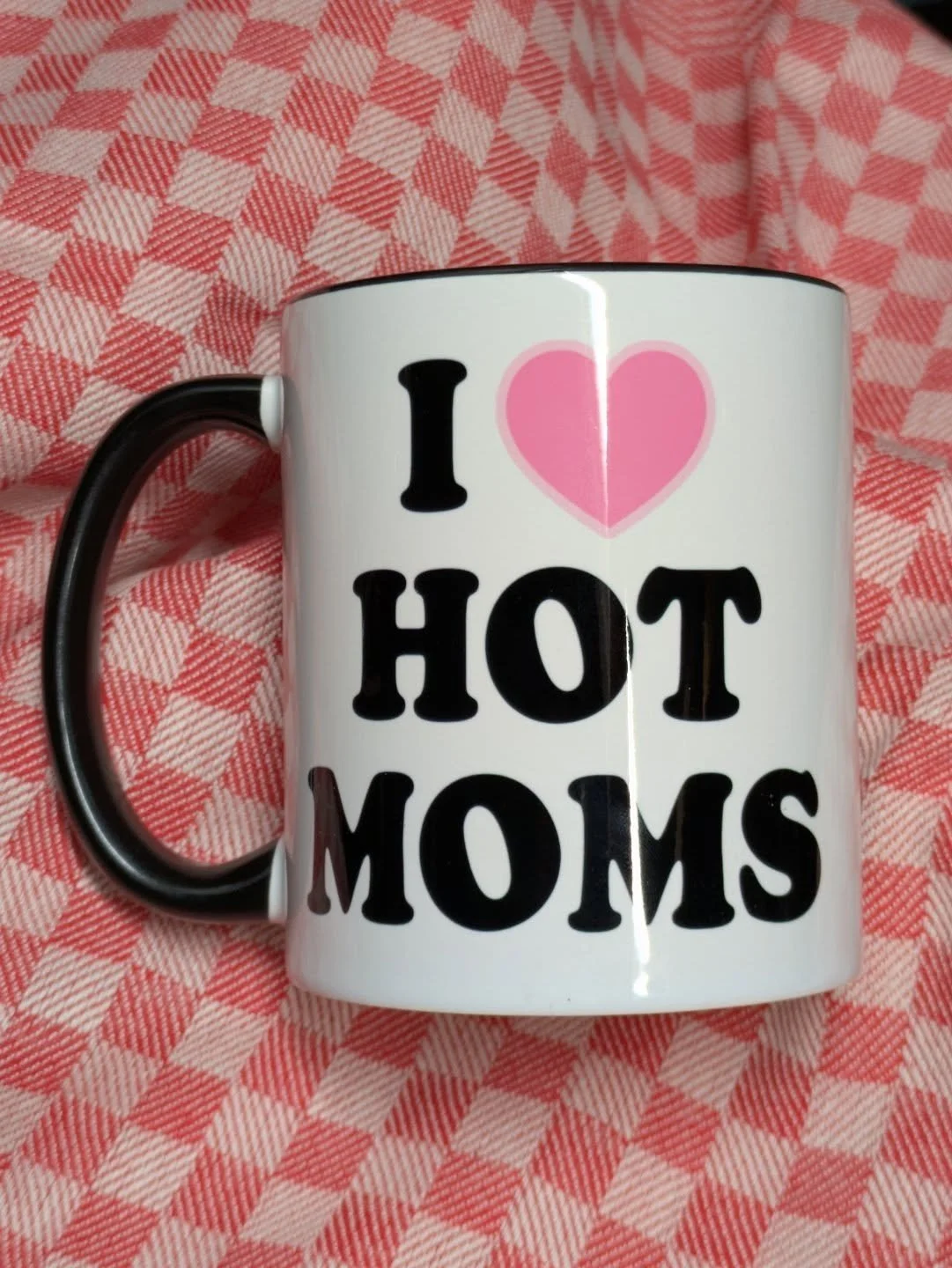 Don't let a little rain keep you from getting Mom just what she deserves. Picture unrelated. Oh and we've got hot dad mugs too of course. If you were wondering.