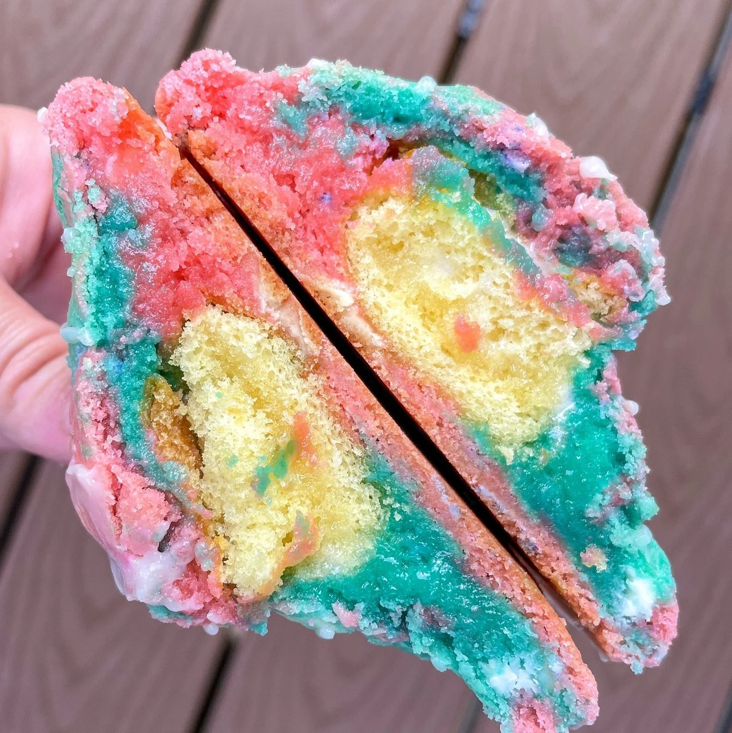 We are SO excited for the return of our Carnival Delight cookie after a few years without it! 🎡🎠🎢

August orders will open this weekend and on the menu is this cotton candy cookie! This two-tone pink and blue base is stuffed with a Twinkie piece, 