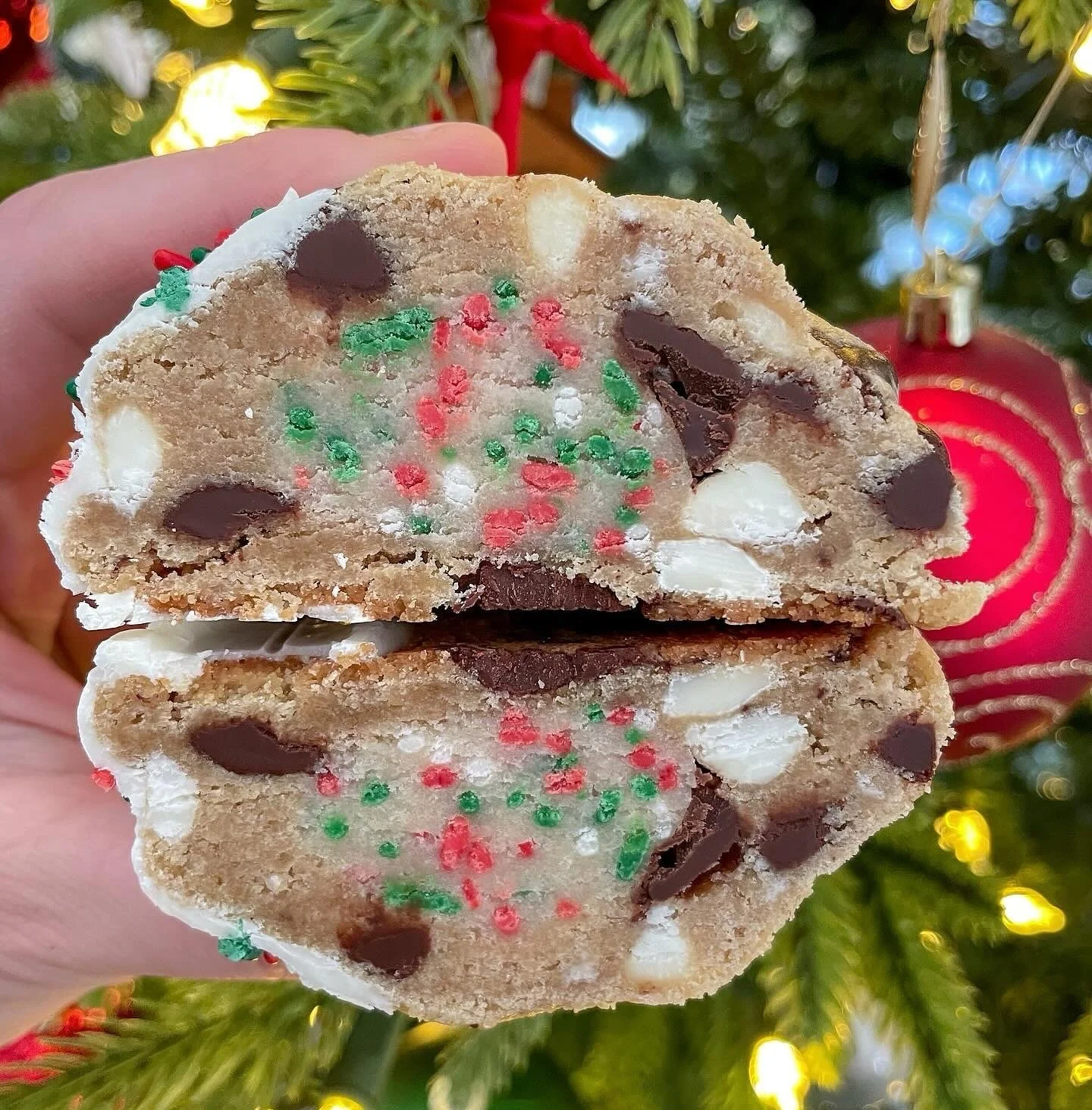 December's lineup just got a whole lot brighter with FaLaLa Chipfetti! Imagine a dark and white chocolate chip cookie filled with red, green, and white edible sugar cookie dough, topped with white chocolate and festive sprinkles. Santa's favorite tre