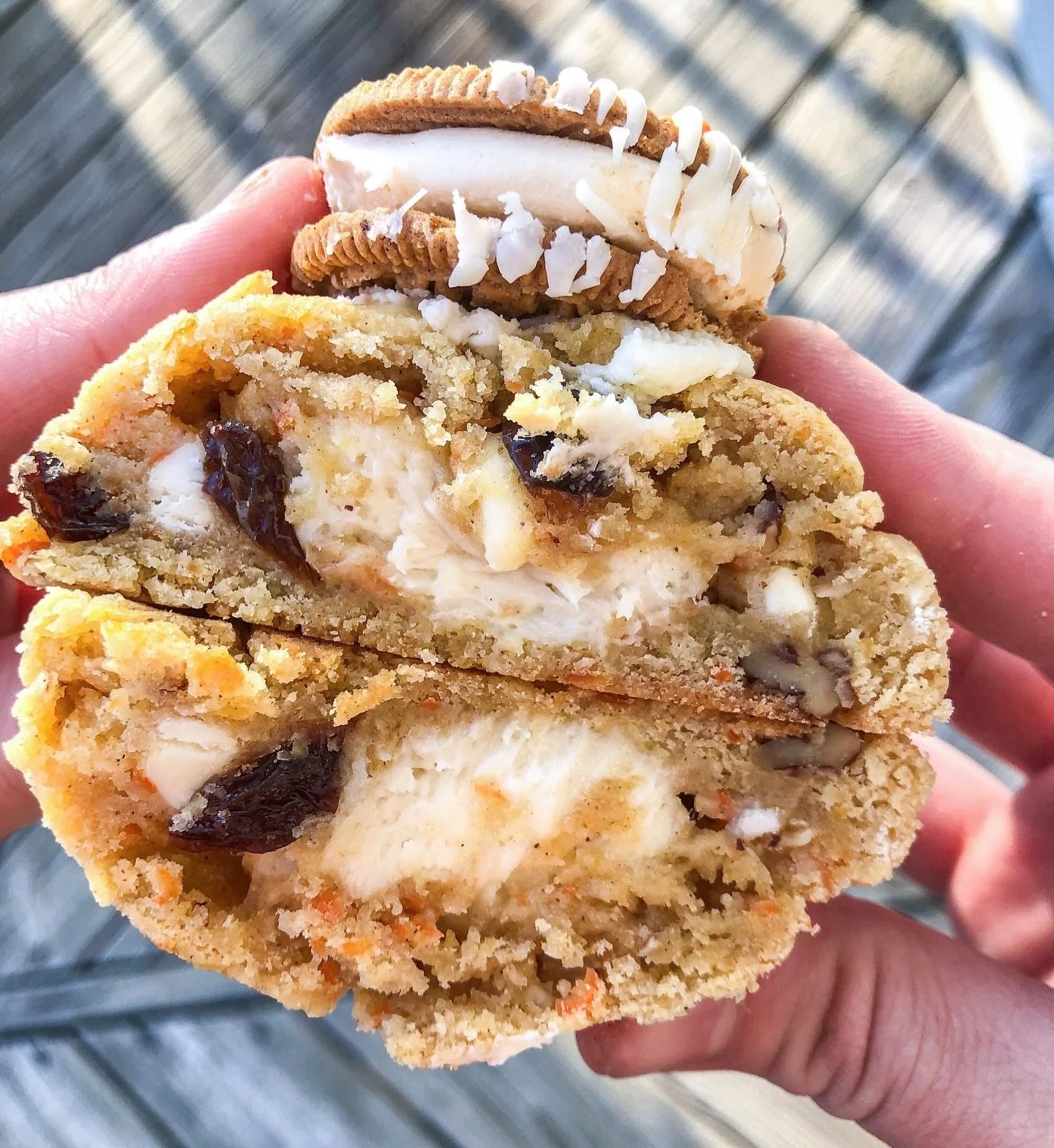 CARROT. CAKE. COOKIES. Need I say more!?!🥕🍪🥕🍪🐰🐰🐰

This carrot spice cookie is mixed with white chocolate chips, pecans, and raisins, and stuffed with a cream cheese filling and topped off with an Oreo (either Carrot Cake or Golden variety&hell
