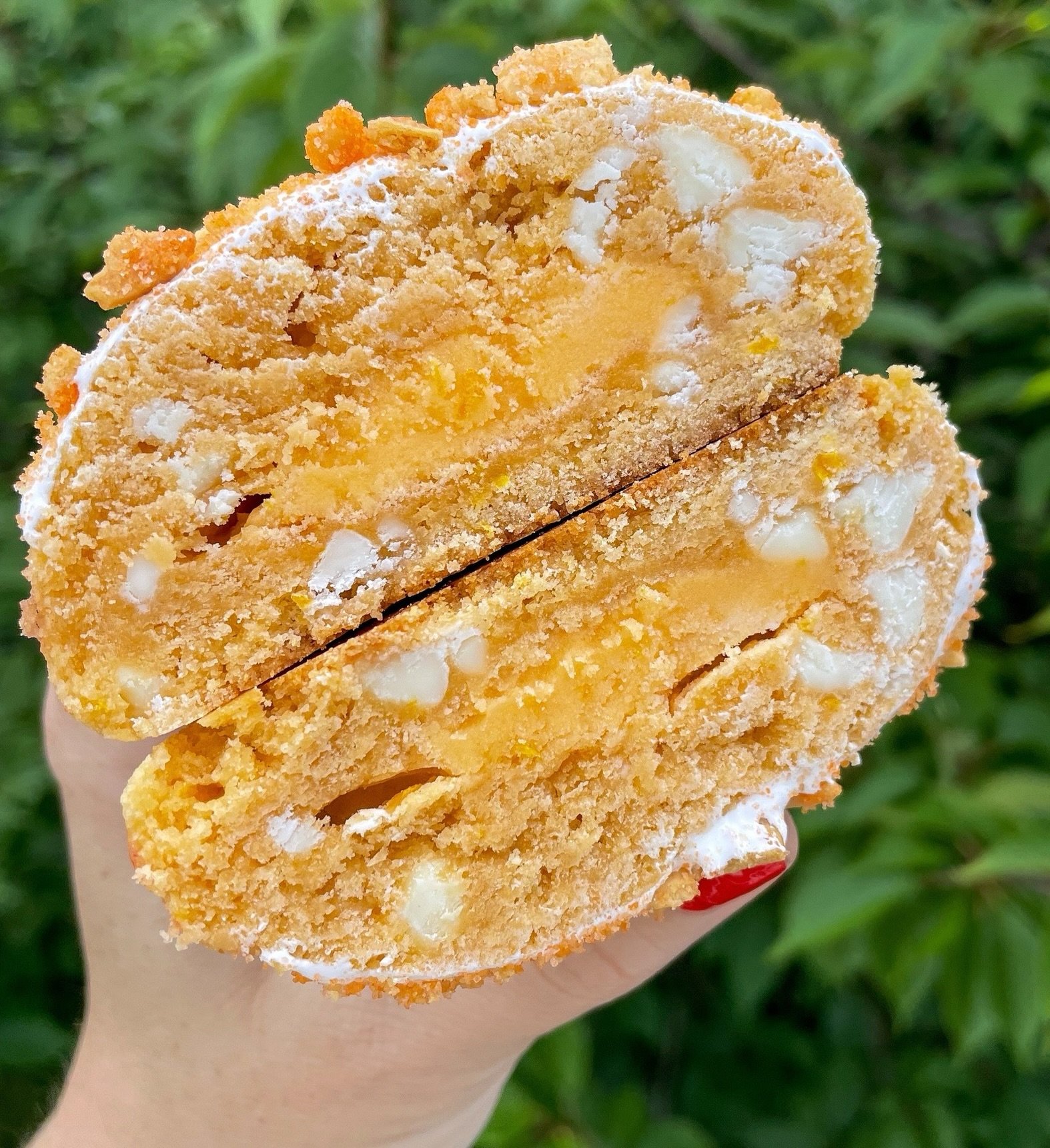Orange Creamsicle is coming your way in July!! This is the perfect summertime treat that will remind you of long days at the pool and ice cream trucks! 🍊🍦

This zesty orange cookie is stuffed with an orange creamsicle buttercream, loaded with white