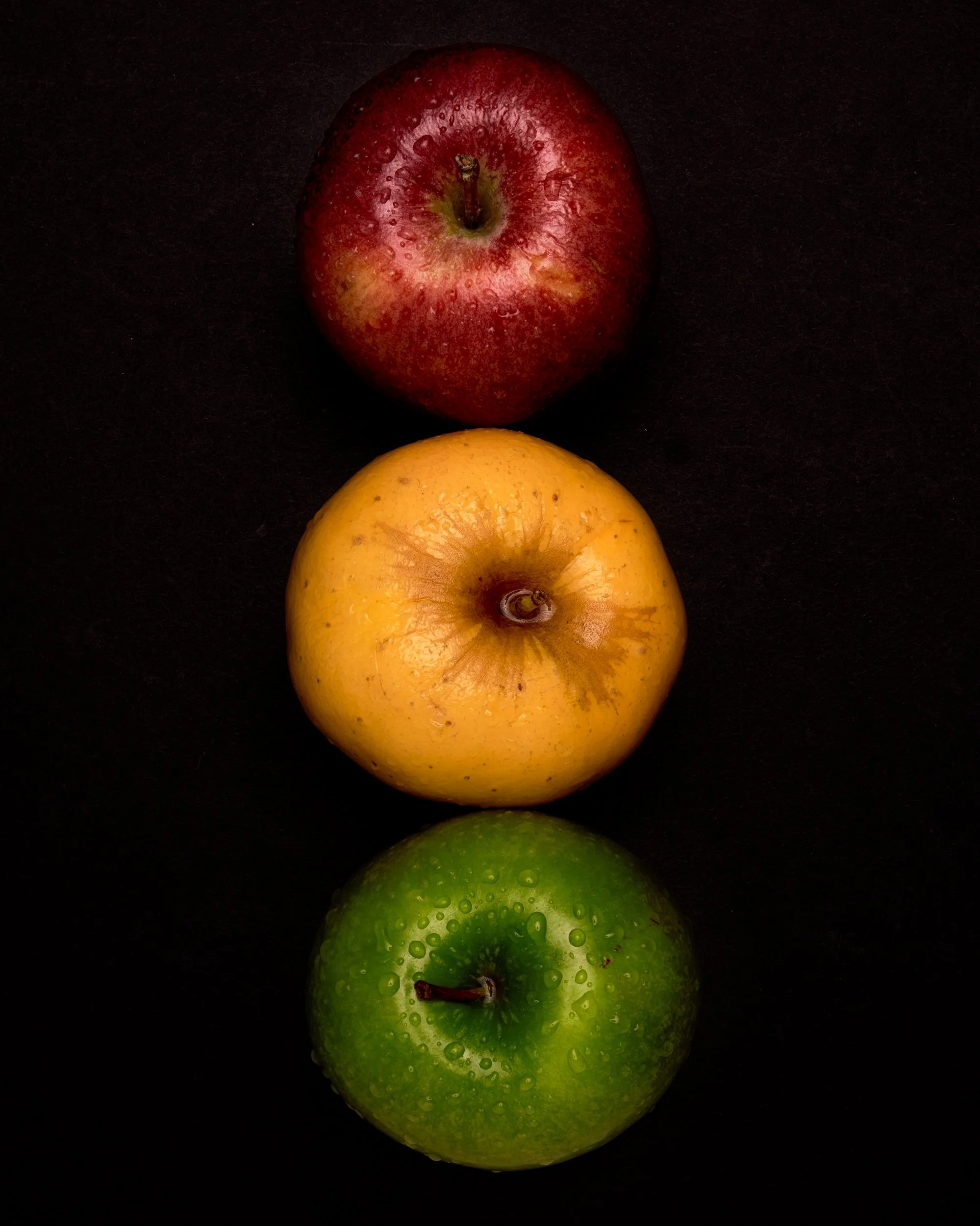 Wet Red Yellow Green Apples in Black Top.jpg