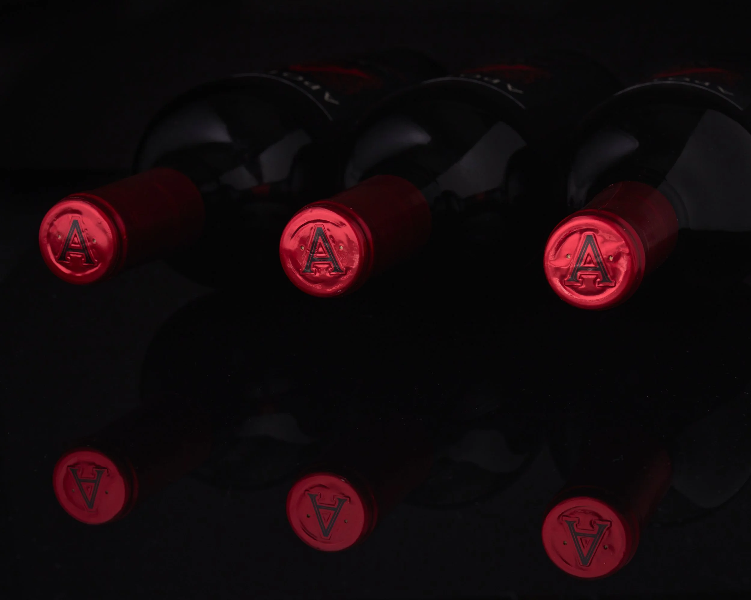 Three As On top of a bottle.jpg