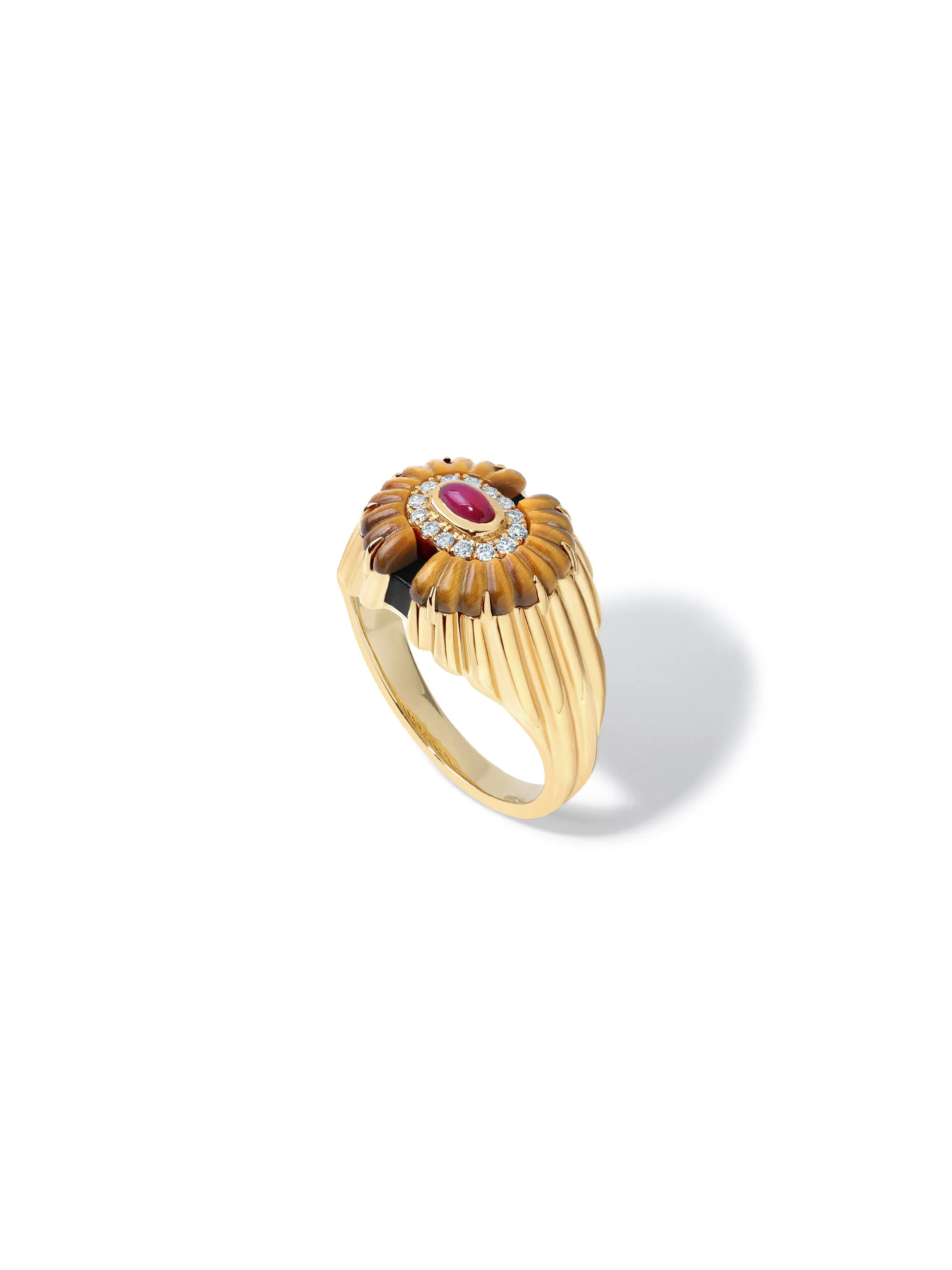 A gold ring with a textured design resembling flower petals, featuring a central red gemstone surrounded by small diamonds.