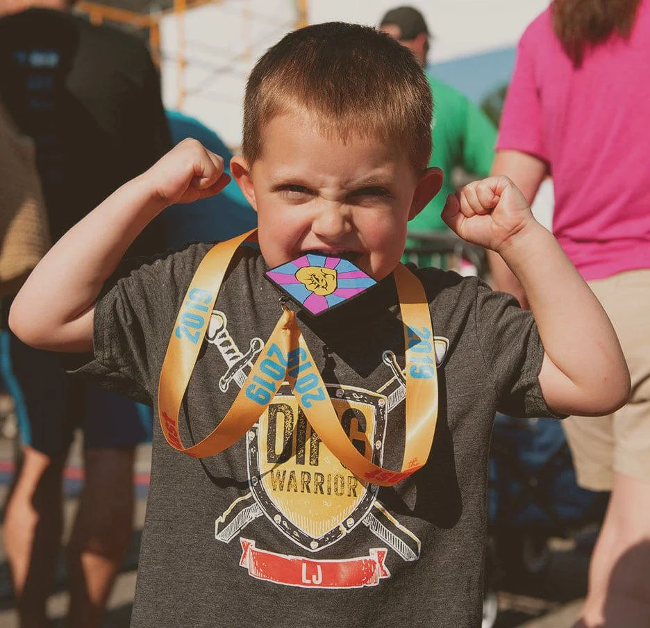 LJ showing off his award medal.JPG