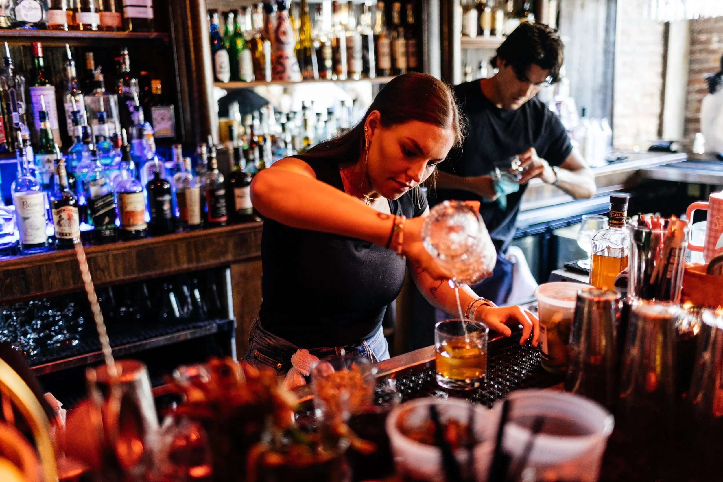 Gray's on Main bartender preparing signature cocktail.jpg