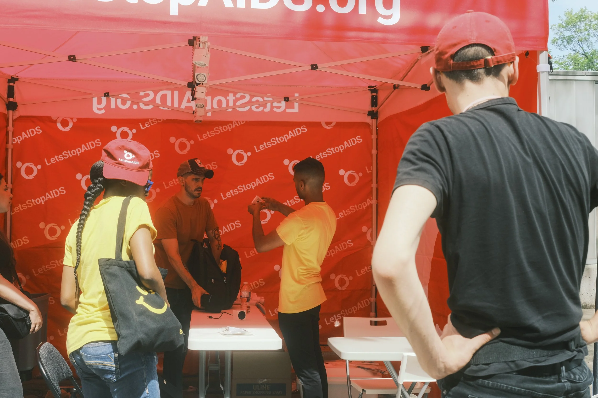 LetsStopAIDS_2022_Pride_Booth_Highlights_Kris_Yue_7.jpg