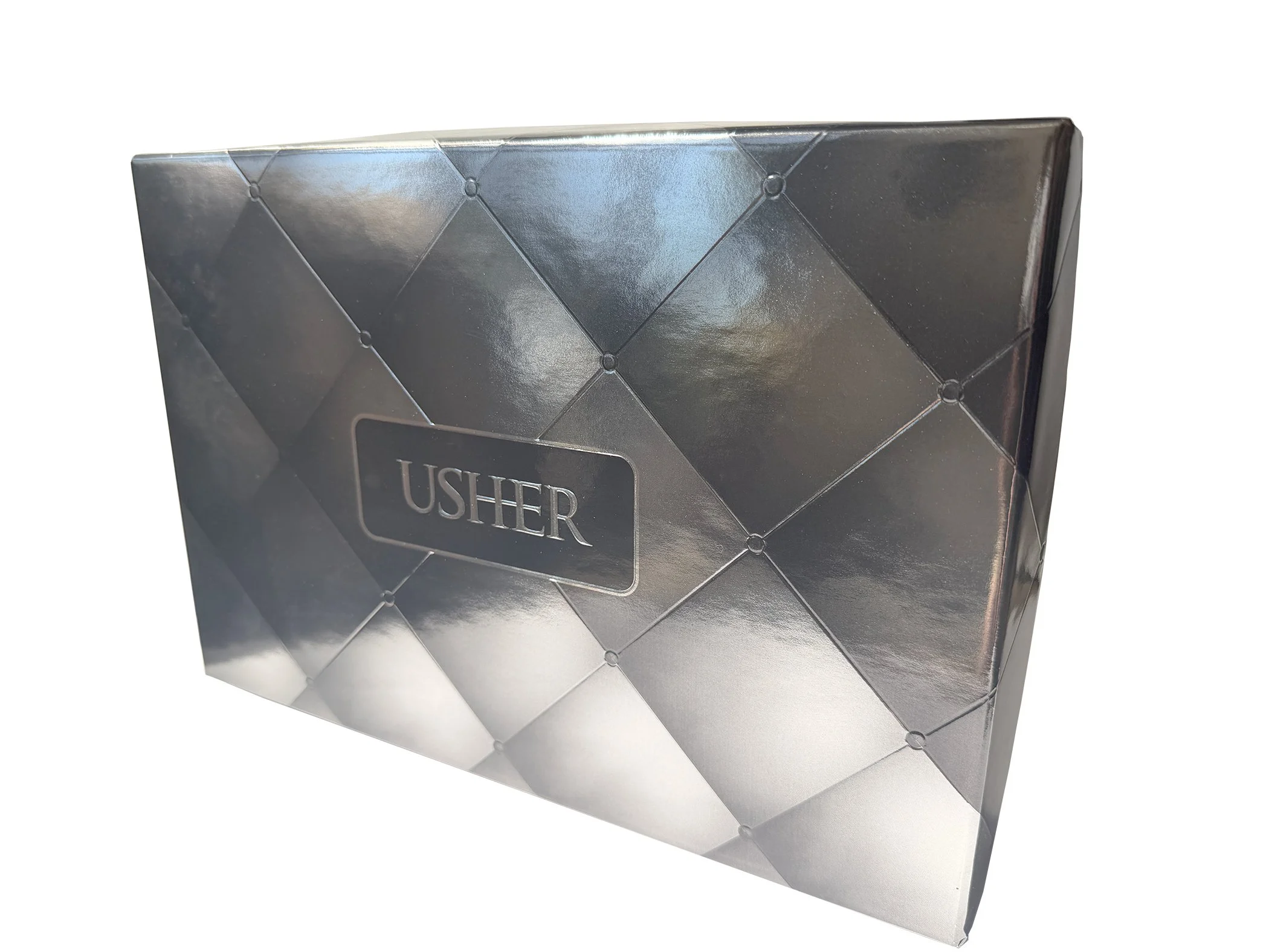 Shiny chrome like quilted box with the word Usher on it