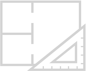 A blueprint or technical drawing with a large ruler and various measured lines and angles.