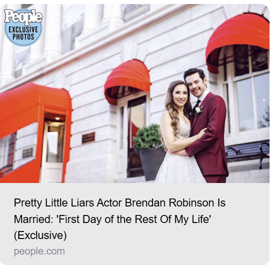 A smiling bride and groom in wedding attire standing outside the Hotel Monaco DC with red awnings, celebrating their wedding day.