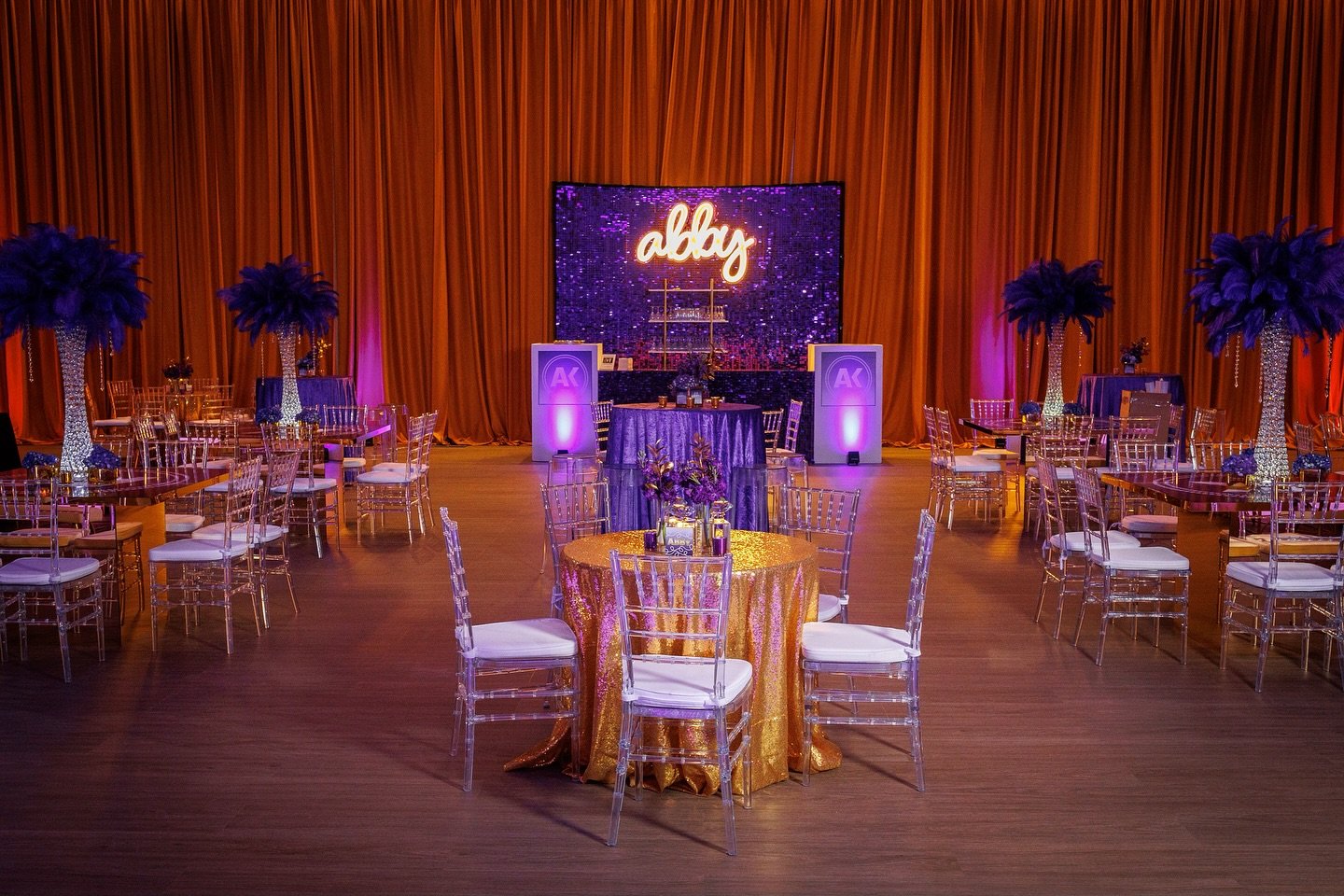 Bold purples, luxe gold accents, and dramatic feather centerpieces set the scene for an unforgettable #batmitzvah ✨💜 From custom signage and keepsakes to the glowing light-up dance floor, every detail was designed to wow. Loved bringing this vision 