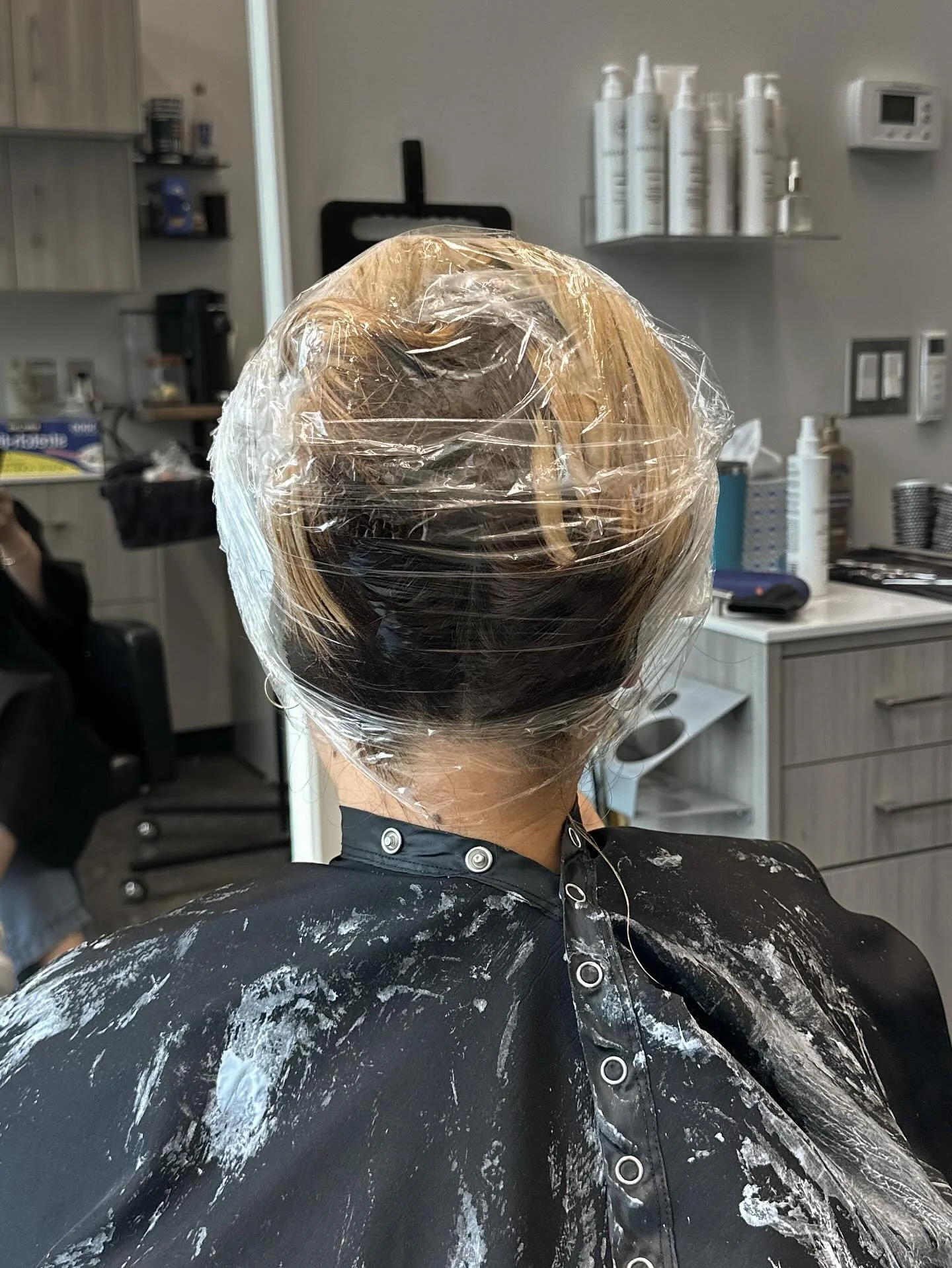 The during, the before + the after
She had recently had her hair high lifted with color which is why it came out with dark ends, light roots and splotches in the middle (where her natural was in between highlights).
Highlift color will *not* lift