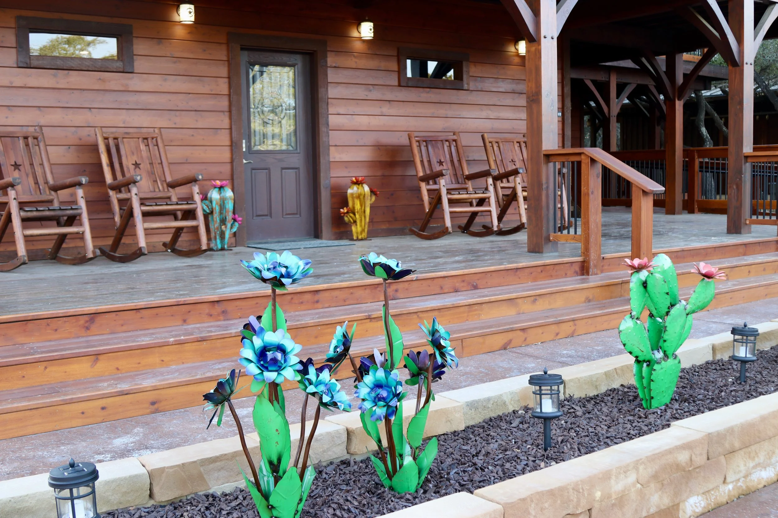 Hope Reins in Texas Front Porch, Rocking Chair, Metal Flowers