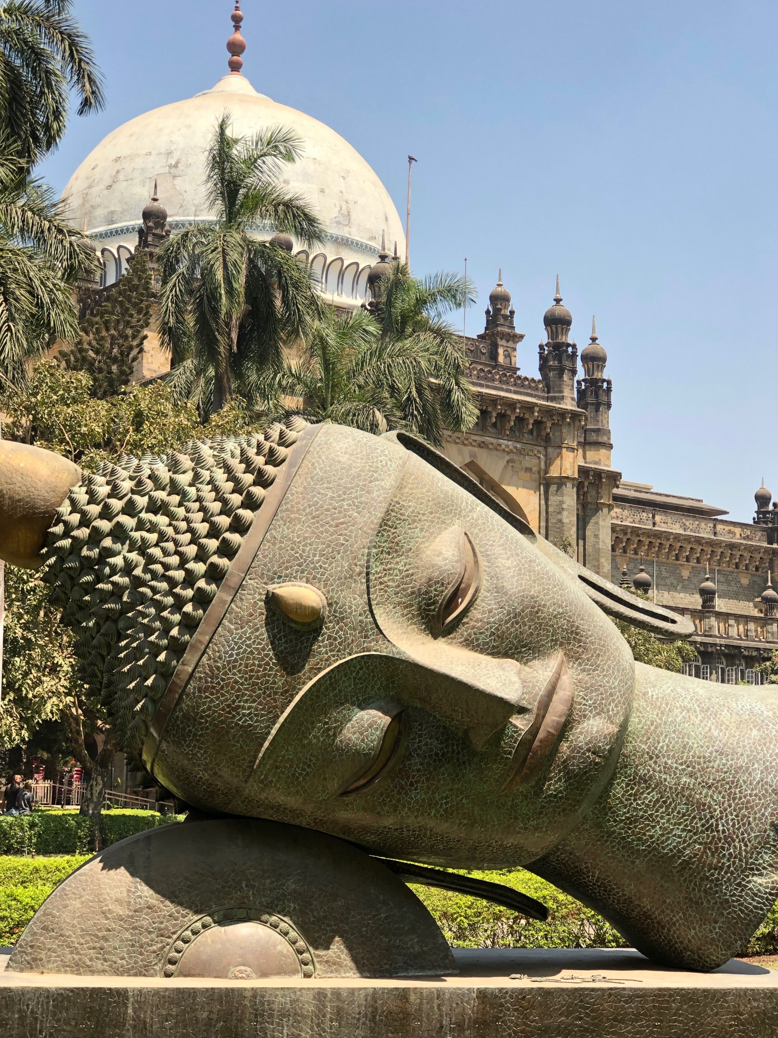 Buddha's head, in the garden of Chhatrapati Shivaji Maharaj Vastu Sangrahalaya, in Mumbai