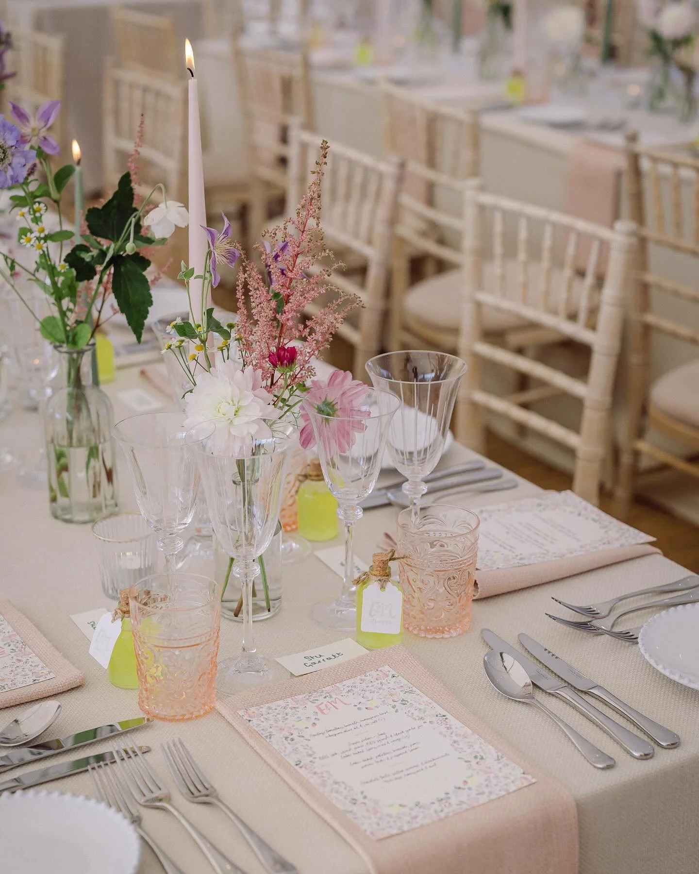 💫Design &amp; styling💫

Textured blush and stone linens, line etched wine glasses, intricate pink tumblers, floral detailed menus, wild and pastel flowers amongst romantic candles. Curated for M&amp;E&rsquo;s countryside summer wedding, we pride ou