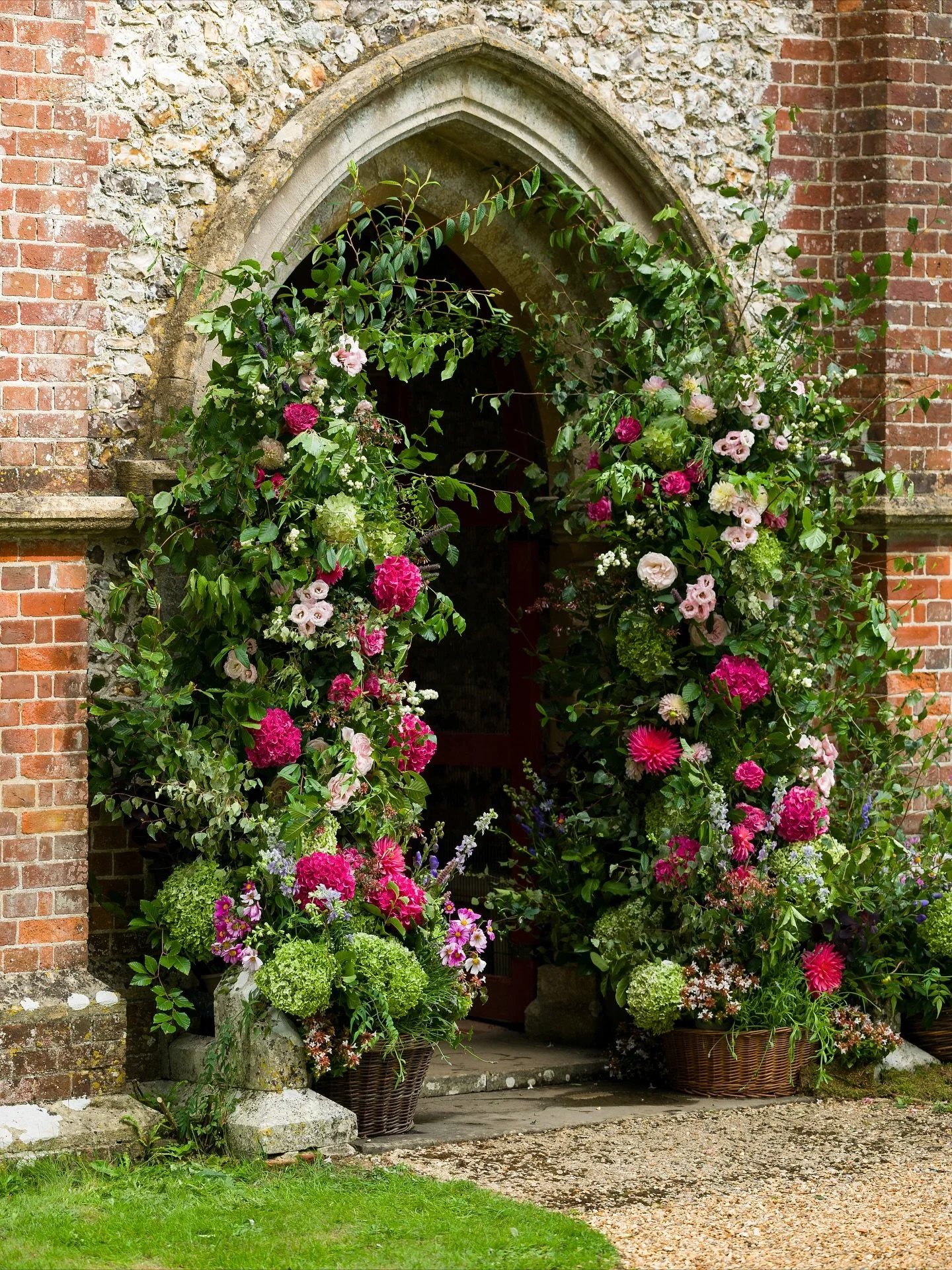 Floral columns 🌸

Pops of vibrant pink creating a bold and bright entrance to this countryside church for S&amp;D&rsquo;s wedding in September. 

🌺 @catherinecoombesflowers 
📸 @greenlysphotography

#weddings #parties #events #birthdays #anniversar