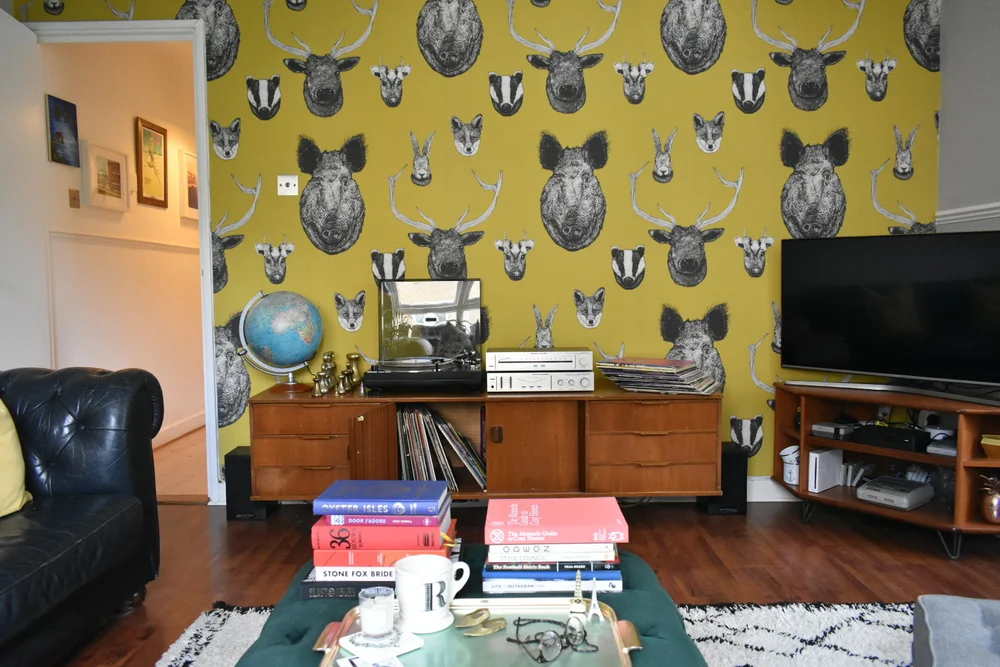 The statement wallpaper in the lounge is from Graduate Collection