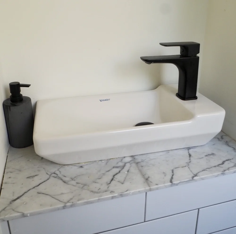 A black tap in the WC loo