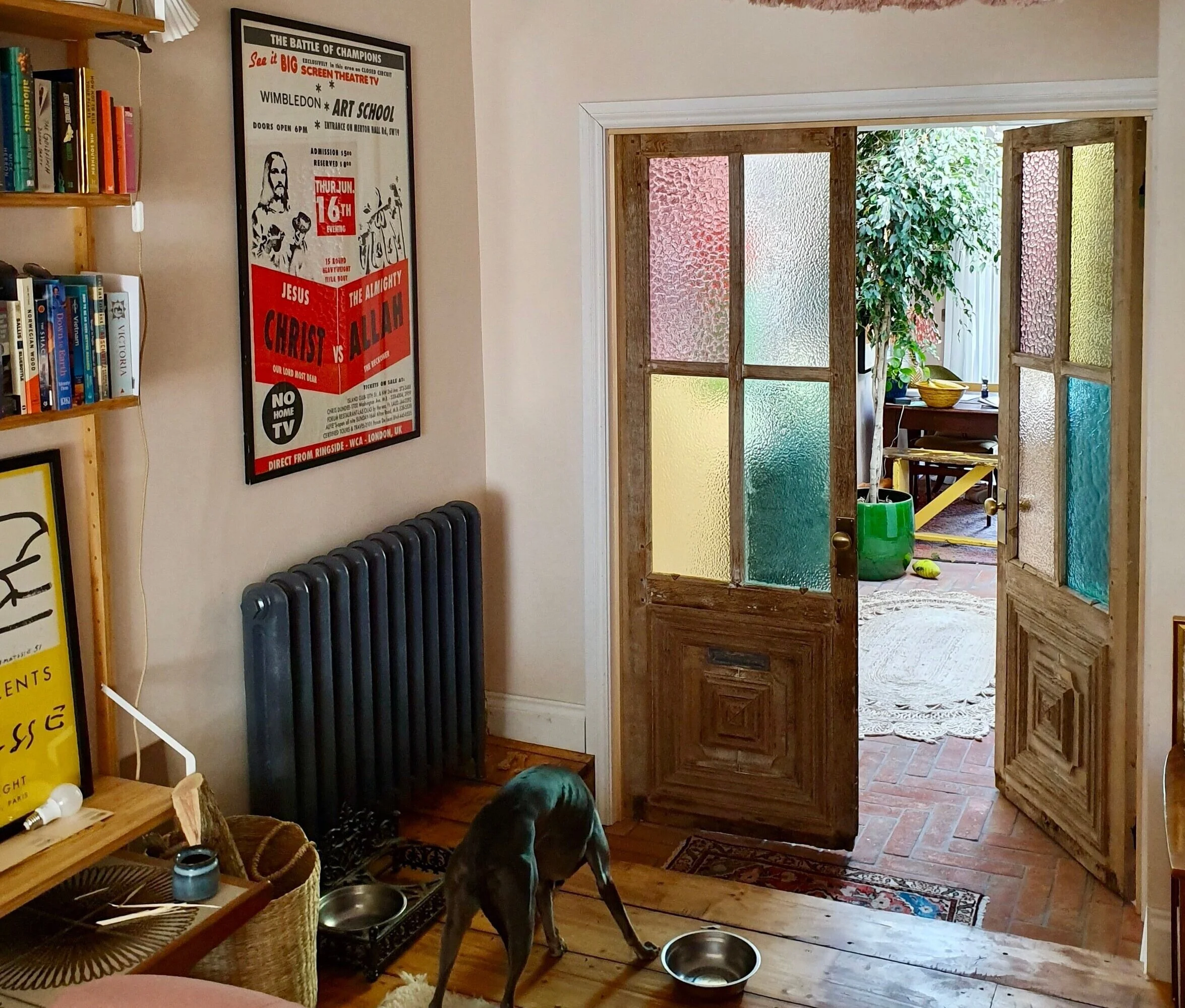 Reclaimed panel doors divide the lounge from kitchen