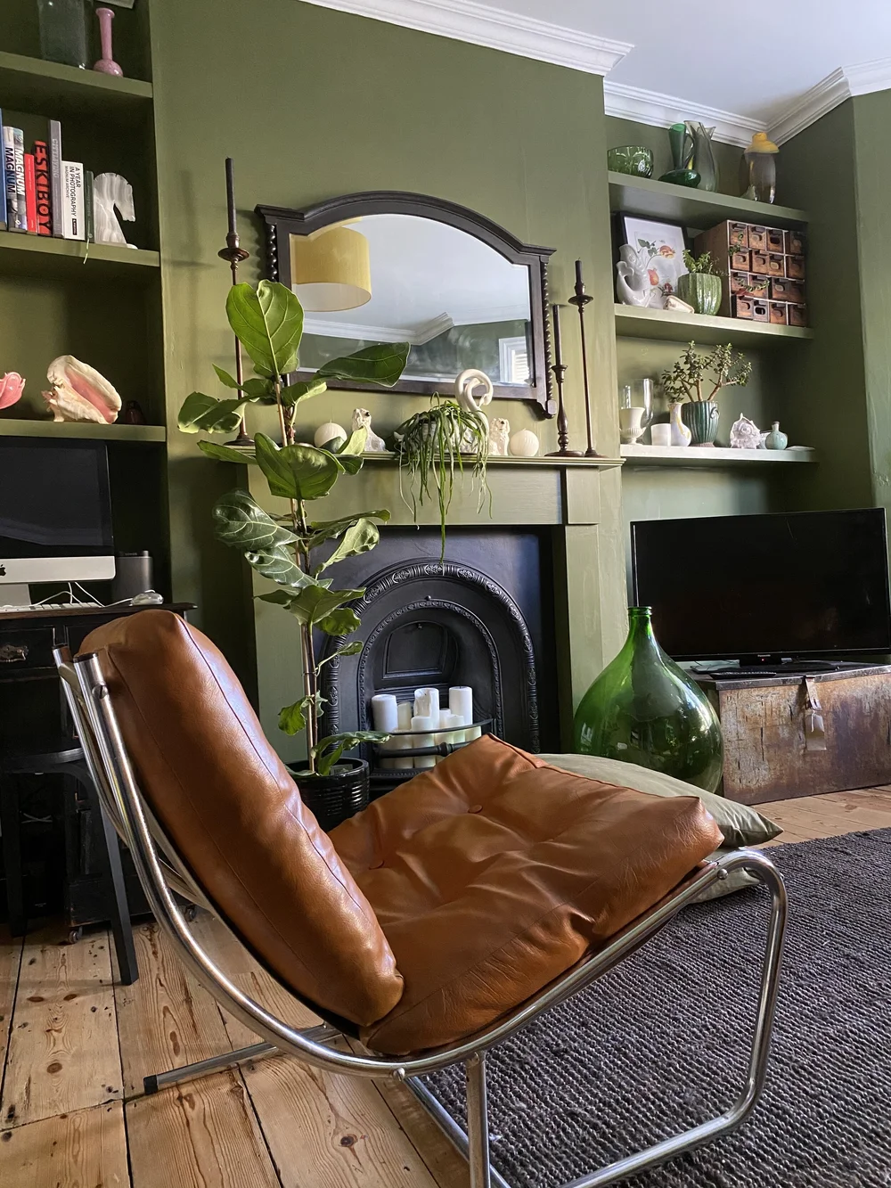 The 1970s brown leather chair was an eBay find