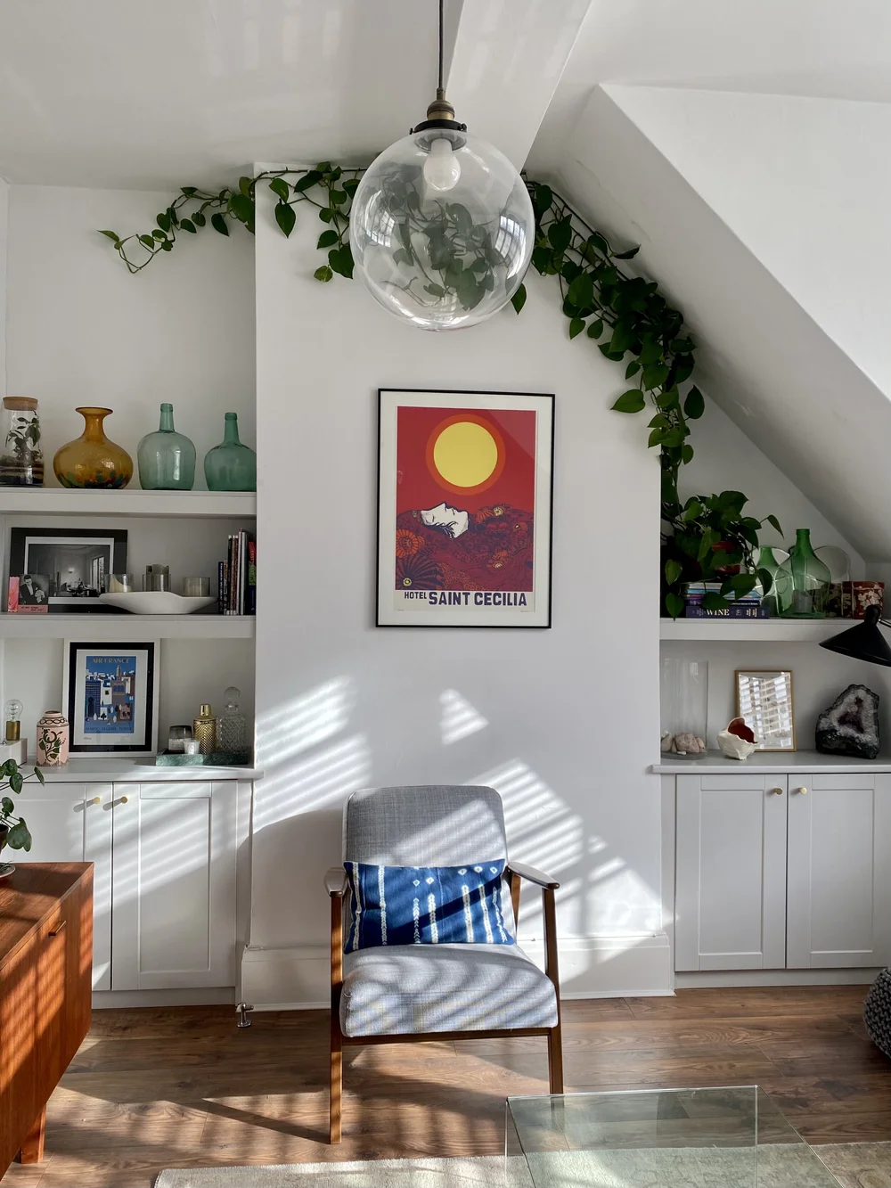 The glass pendant in the sitting room is from Heal’s