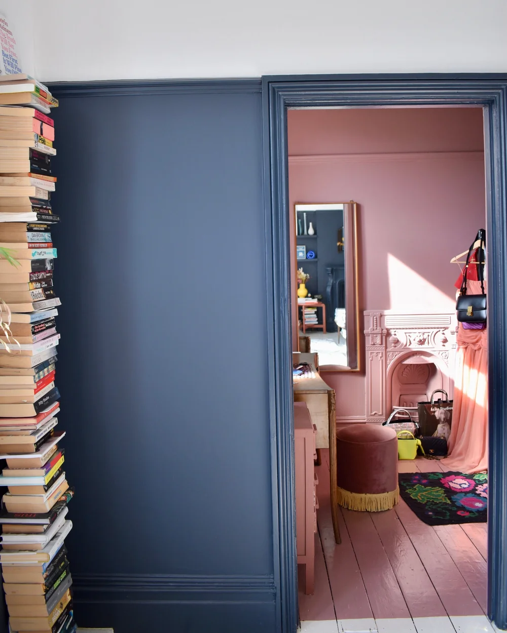A view into Natasha’s dressing room, which is painted entirely in Blush by Little Greene - from floor to ceiling