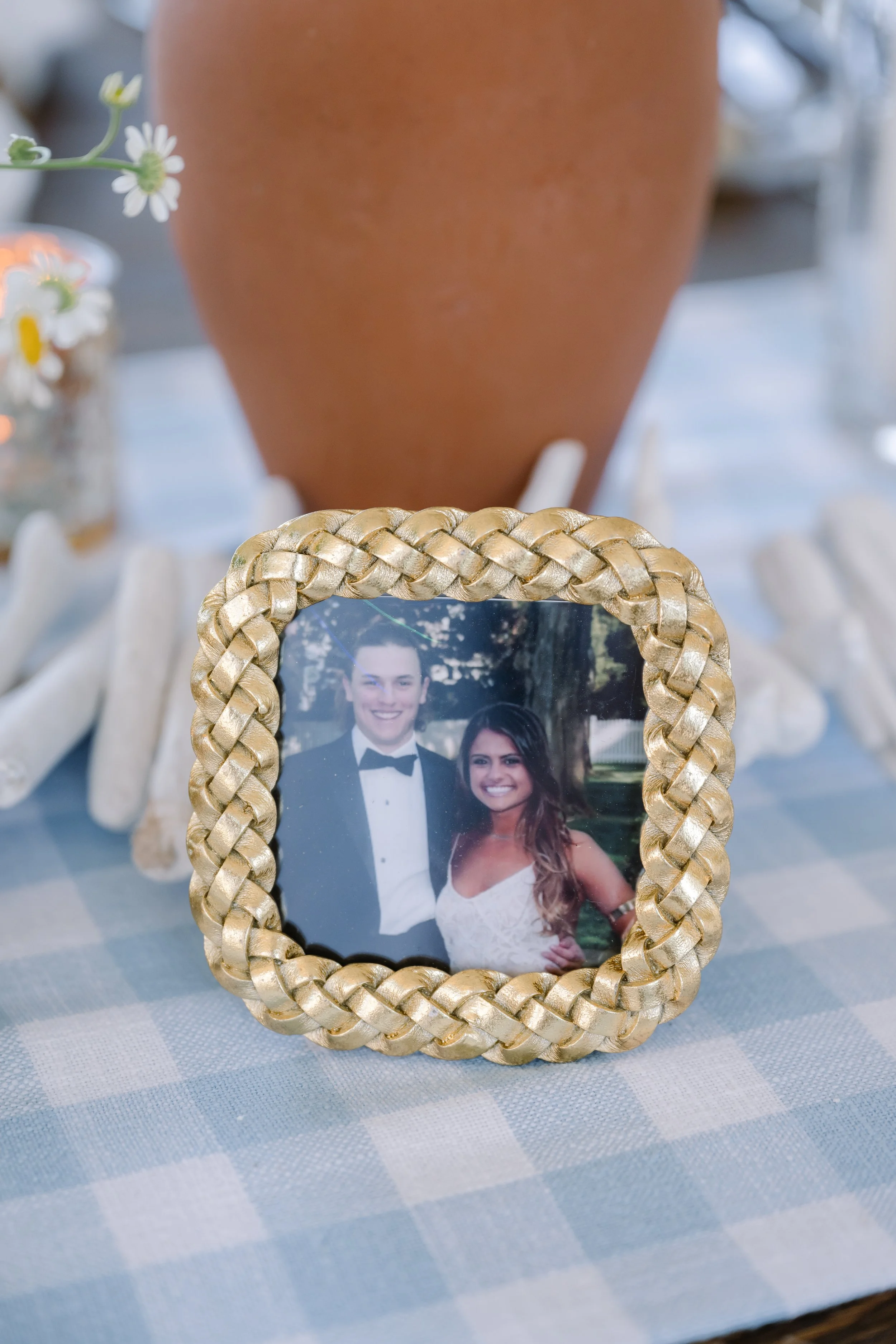 Elegant coastal wedding rehearsal dinner table setting