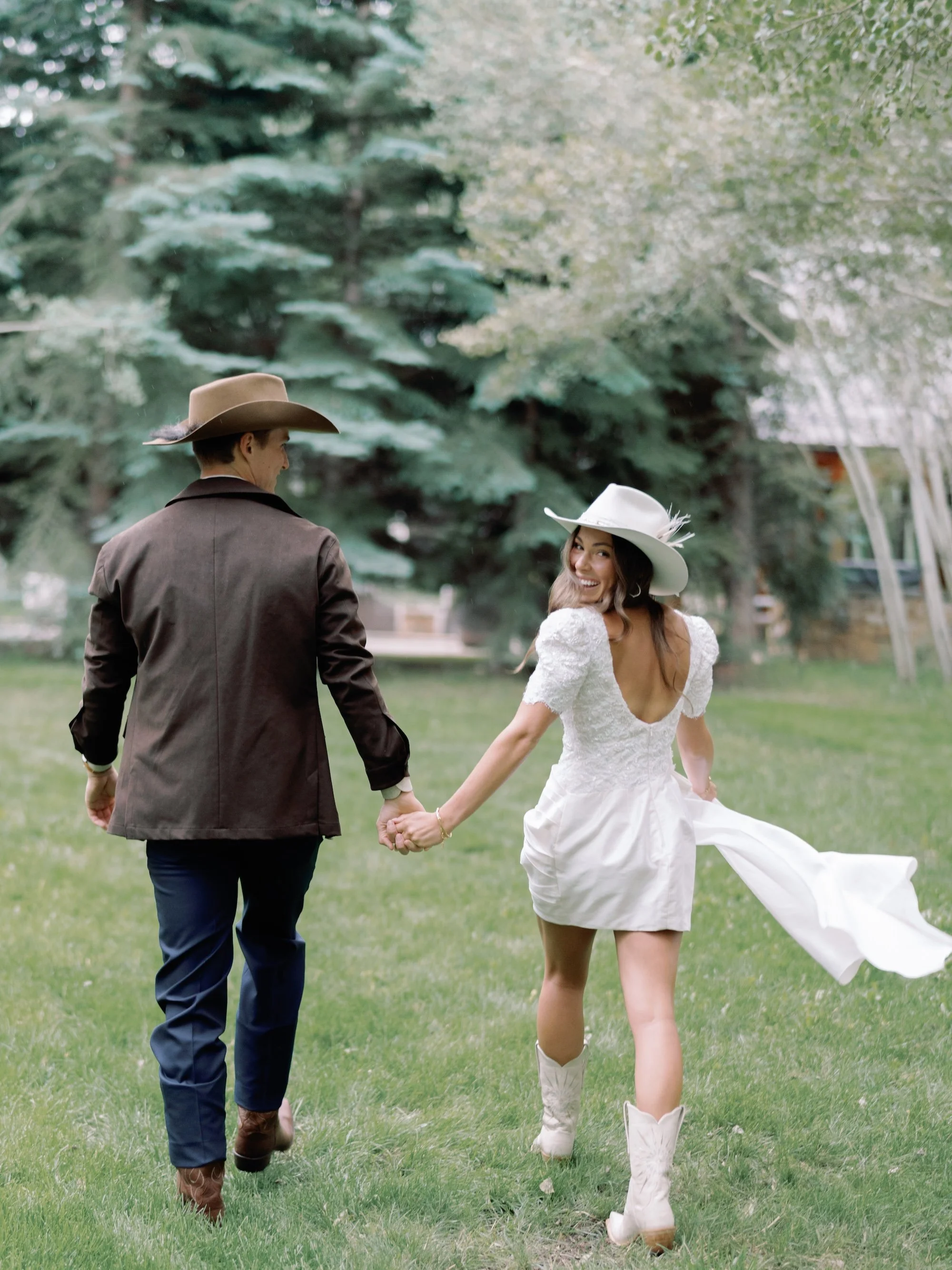 bride-groom-cowboy-boots-hats-refined-colorado-countryside-wedding-rehearsal-dinner-western-backyard-lets-get-rehearsed-2.JPG