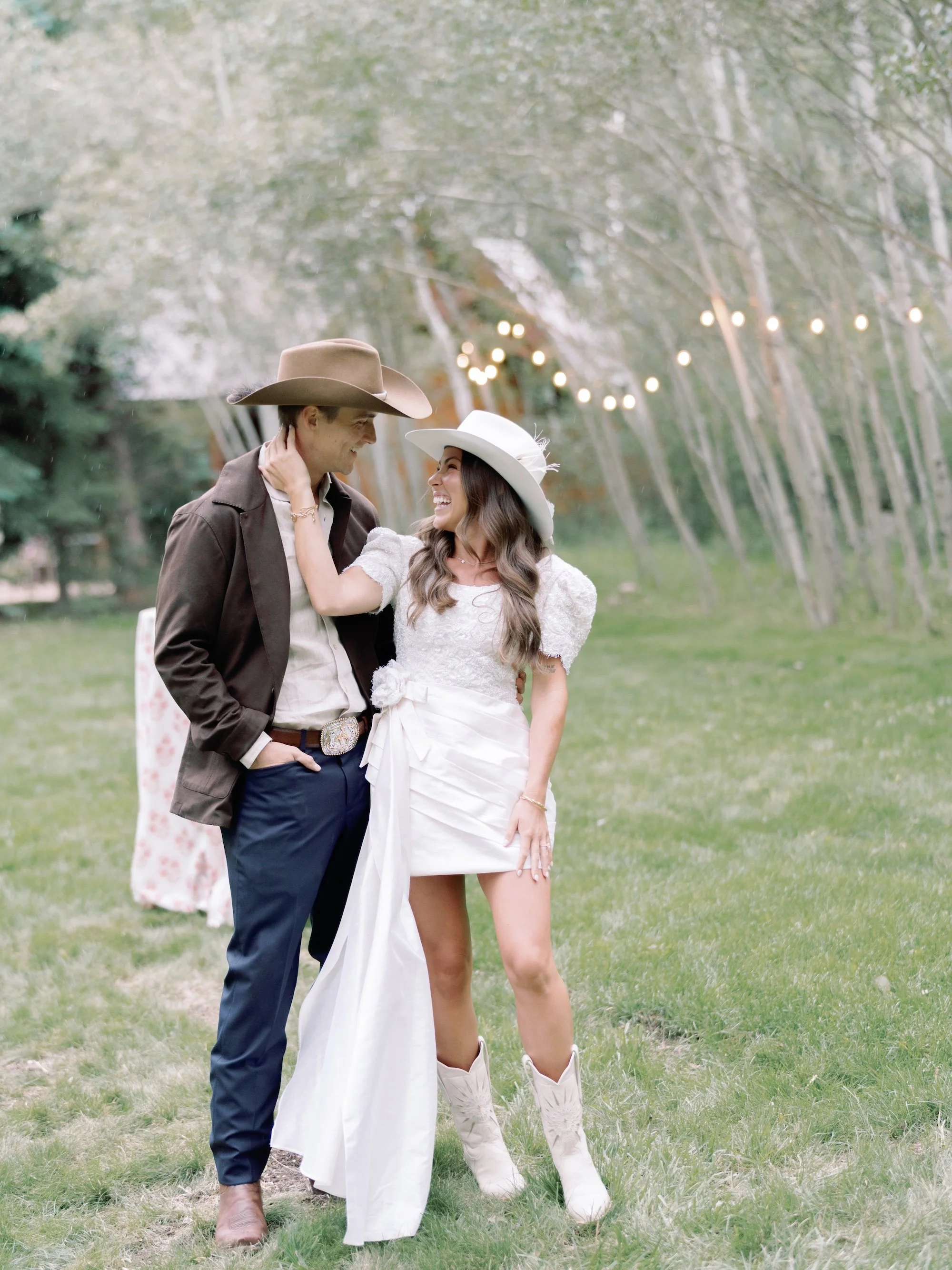 bride-groom-cowboy-boots-hats-refined-colorado-countryside-wedding-rehearsal-dinner-western-backyard-lets-get-rehearsed-1.JPG