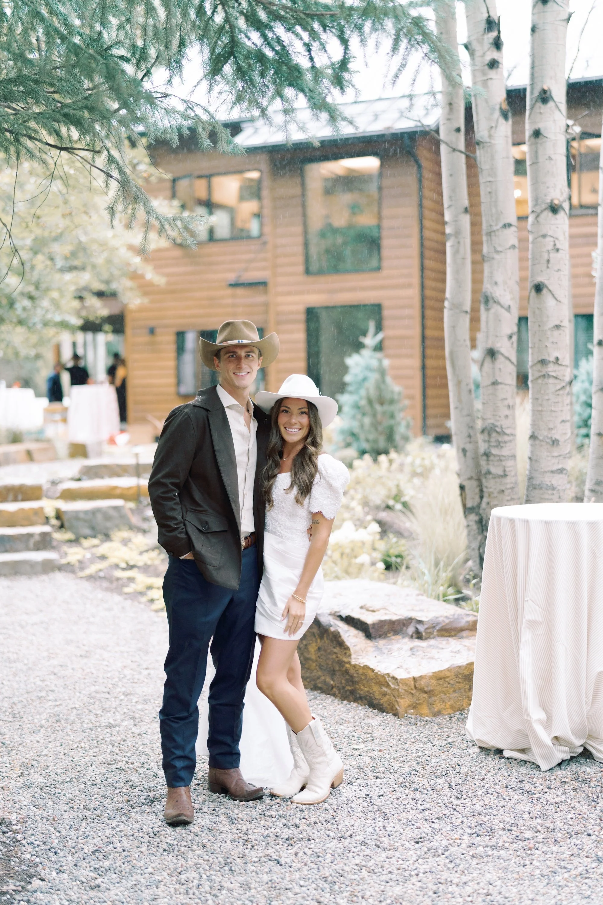 bride-groom-cowboy-boots-hats-refined-colorado-countryside-wedding-rehearsal-dinner-western-backyard-lets-get-rehearsed-3.JPG