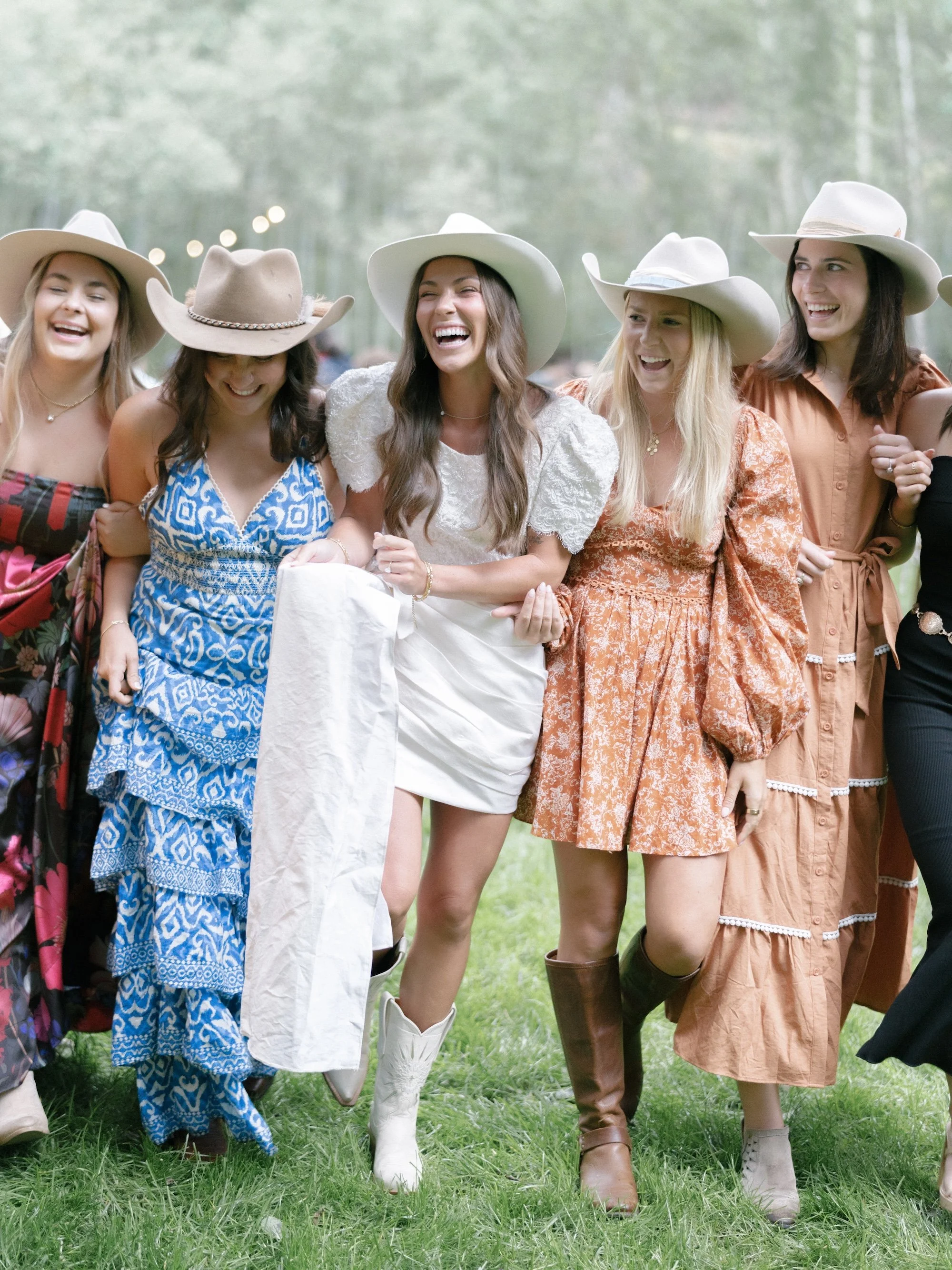 bride-bridesmaids-boots-hats-refined-colorado-countryside-wedding-rehearsal-dinner-western-backyard-lets-get-rehearsed.JPG
