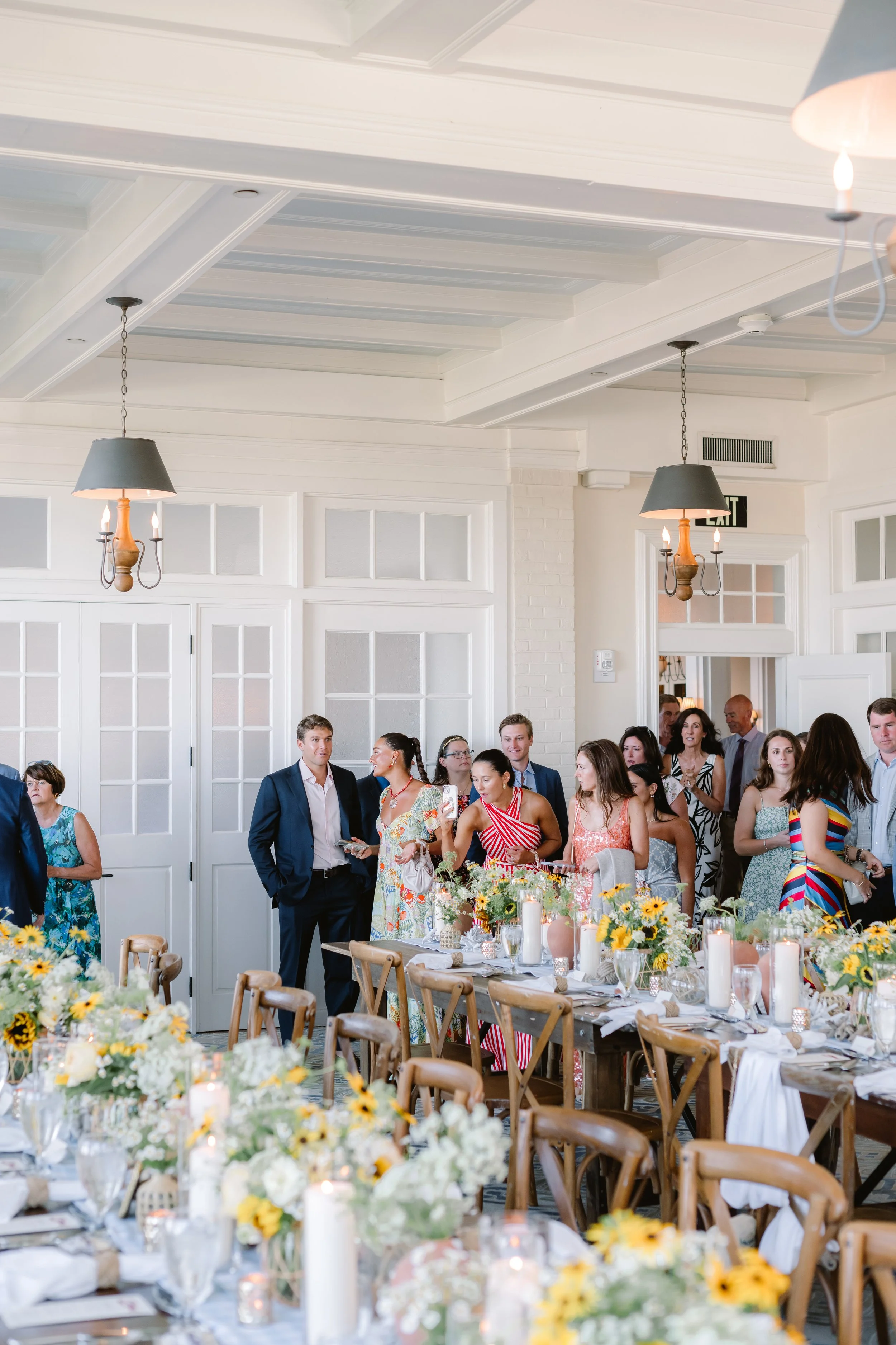 Elegant coastal wedding rehearsal dinner table setting