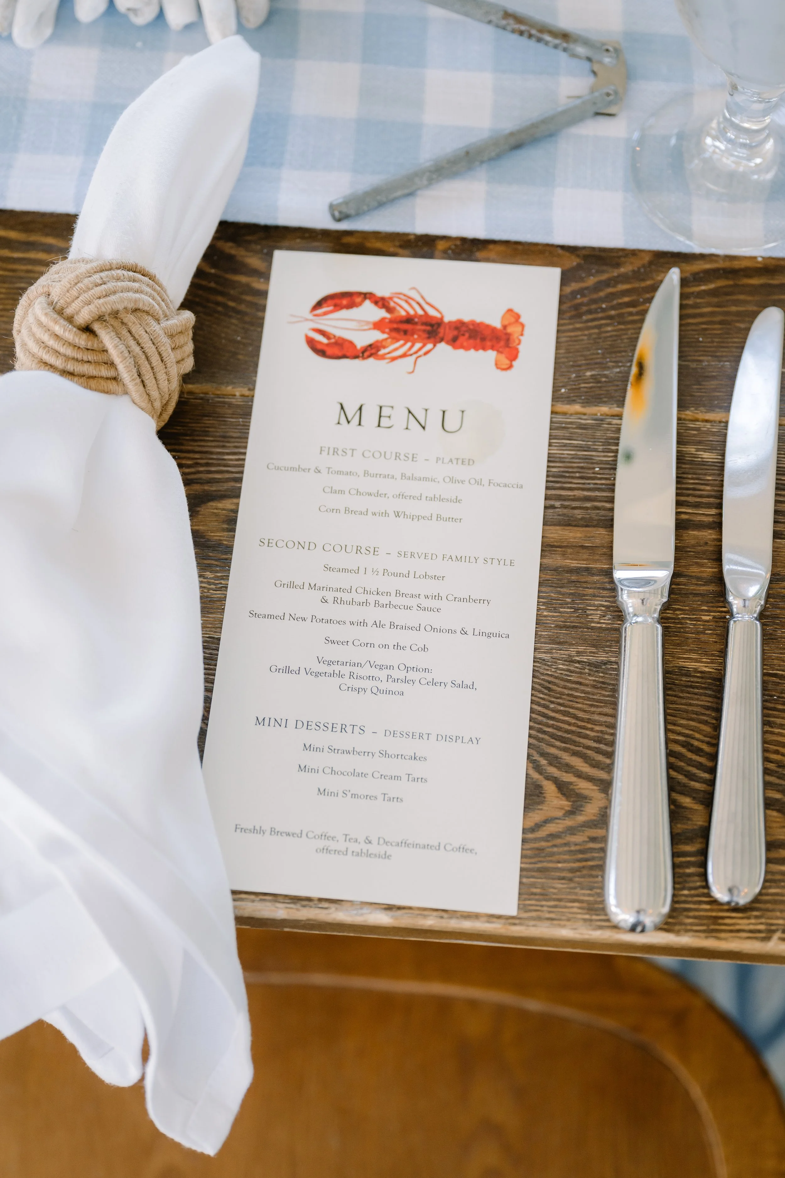 Elegant coastal wedding rehearsal dinner table setting